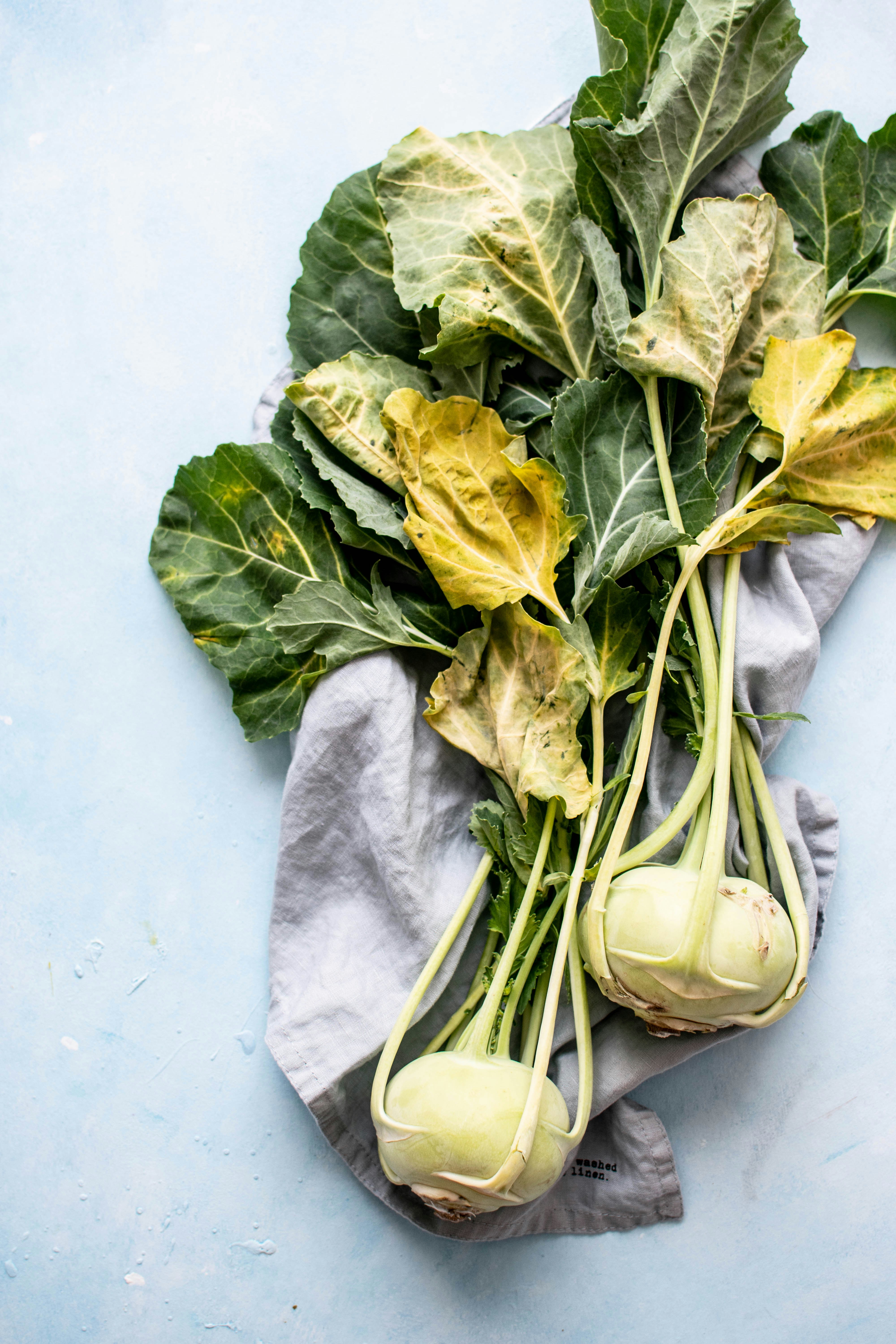 green vegetable on white surface