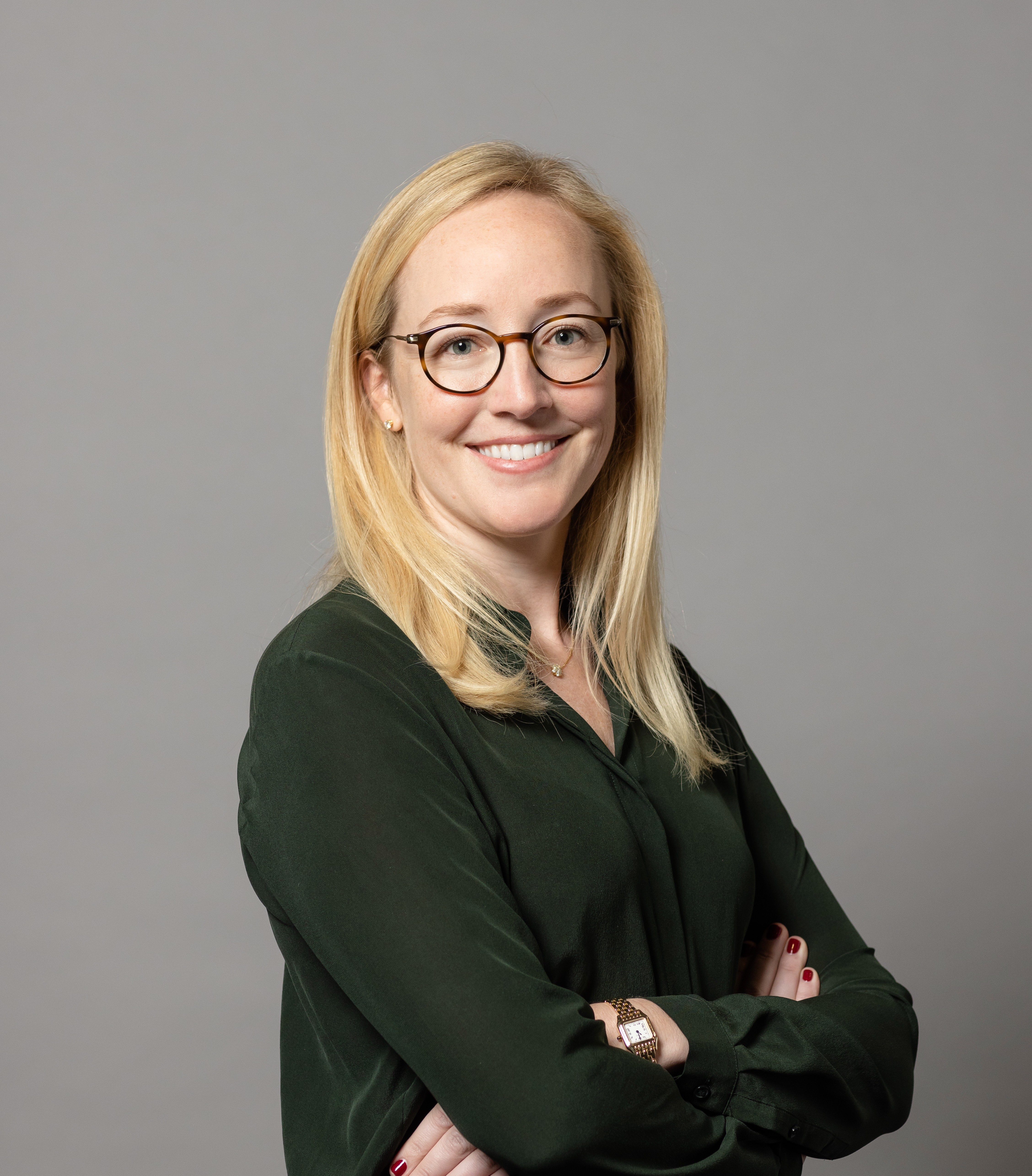 modern living room and kitchen with wooden cabinets and soft natural light