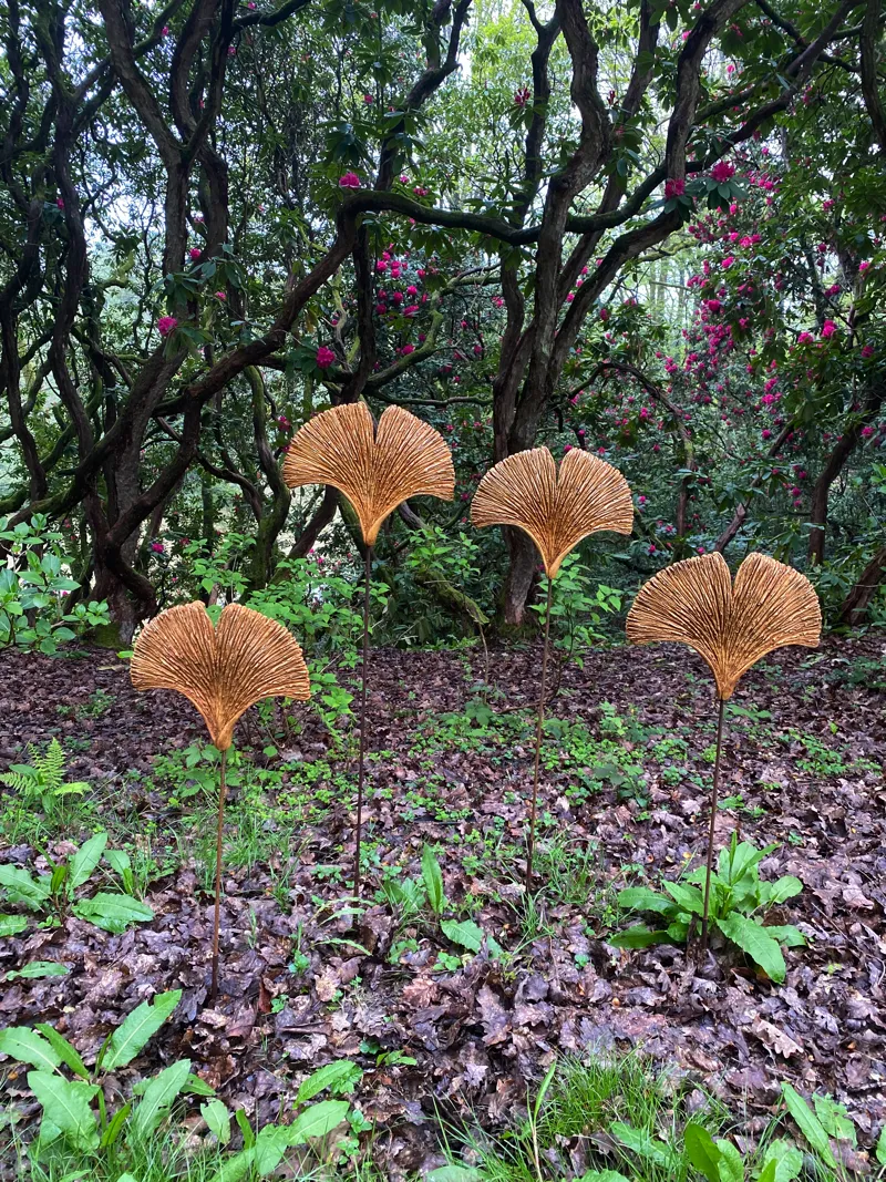 group of ginko wave sculptures in garden