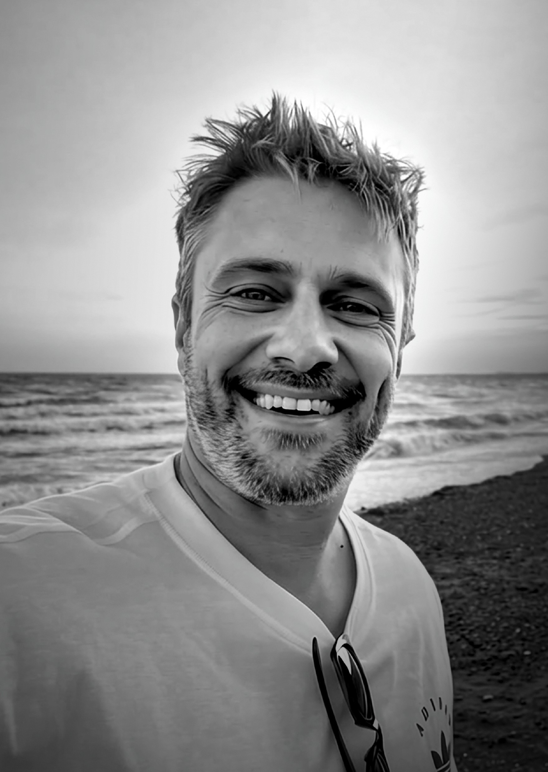 man in black knit cap and black framed eyeglasses