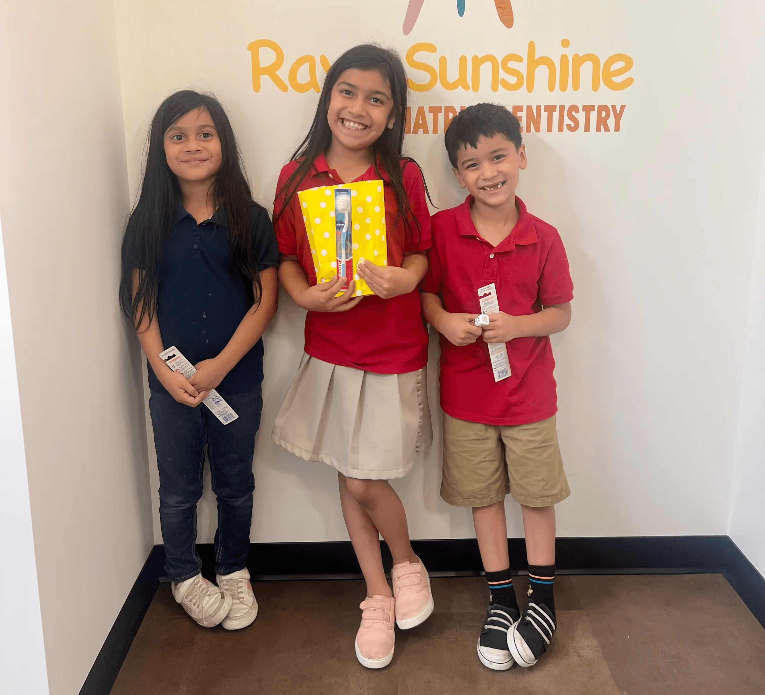 Three smile child with brushteeth