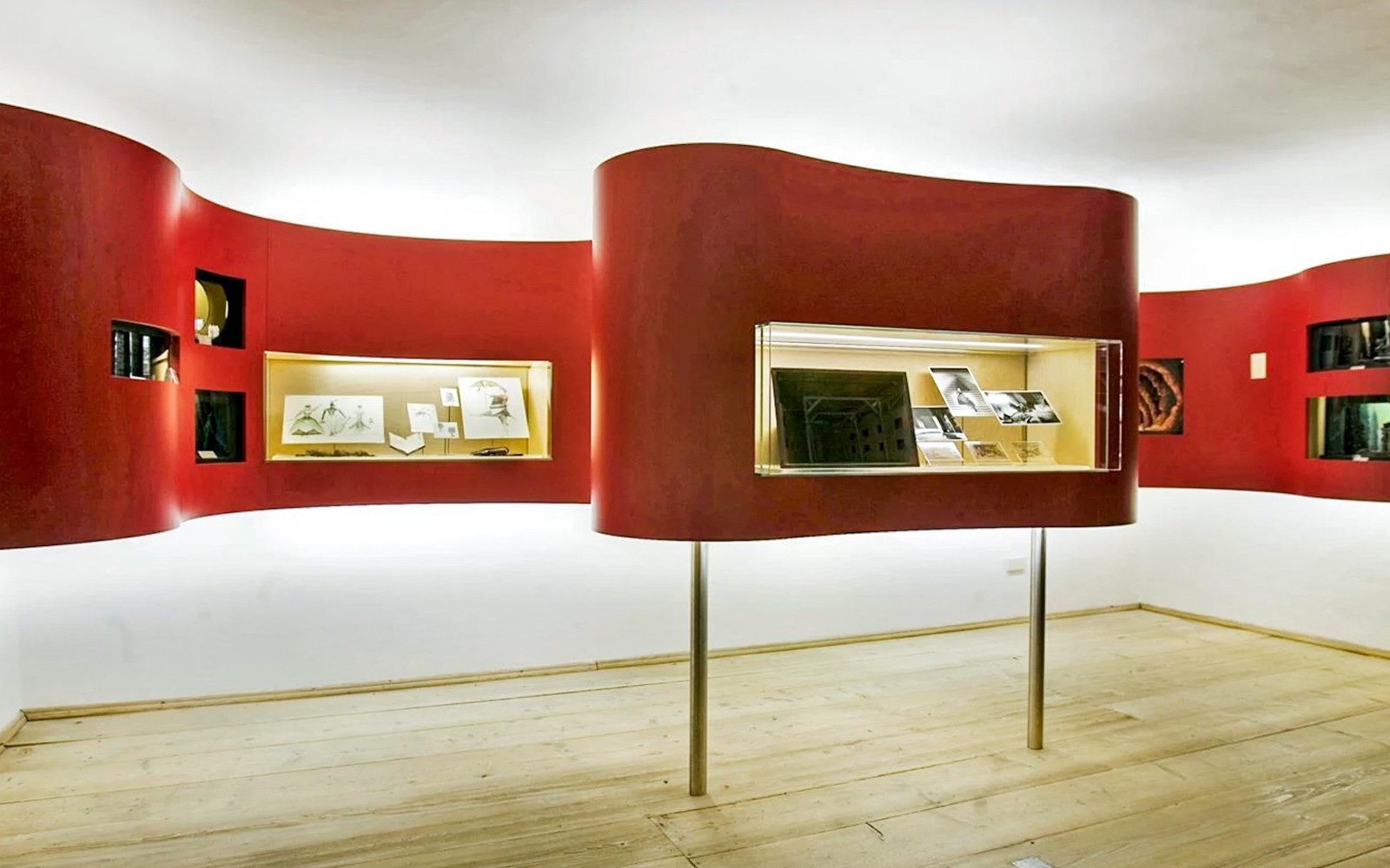 Exhibit display in Salzburg museum showcasing historical documents and artifacts.