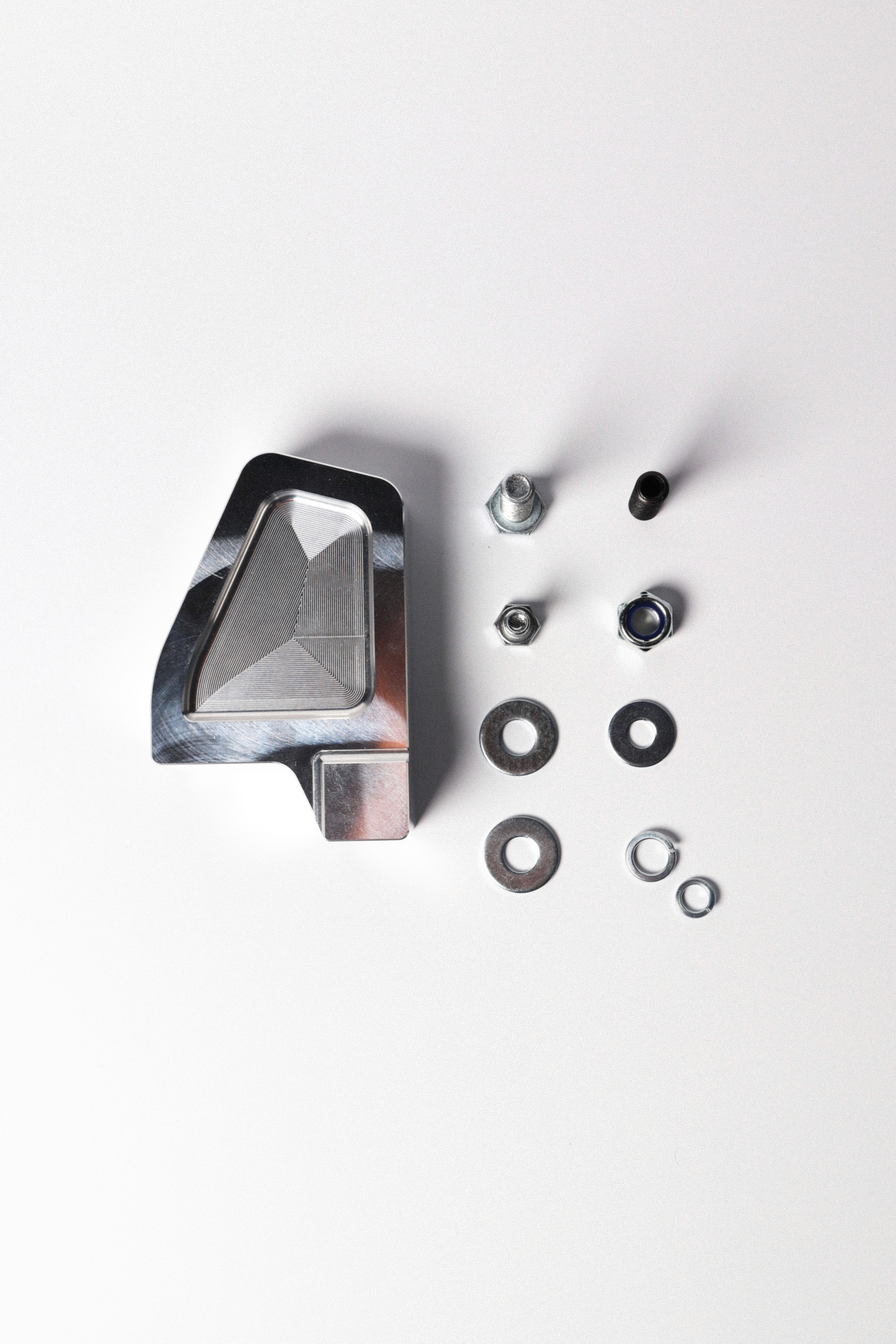 Top down shot of an engine mount and bolts