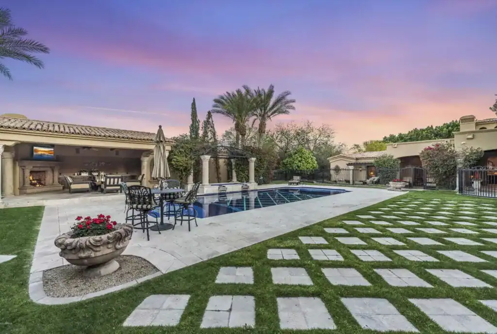 Mosaic pool waterline border with intricate mosaic tile design enhancing the pool's elegance.