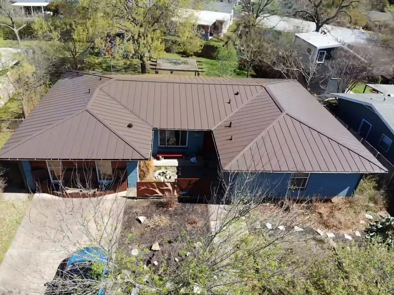 After - another angle: metal roofing around a recessed entry.