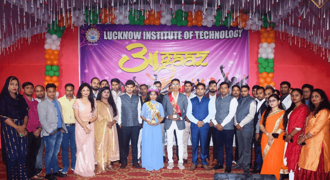 man standing in front of people sitting beside table with laptop computers