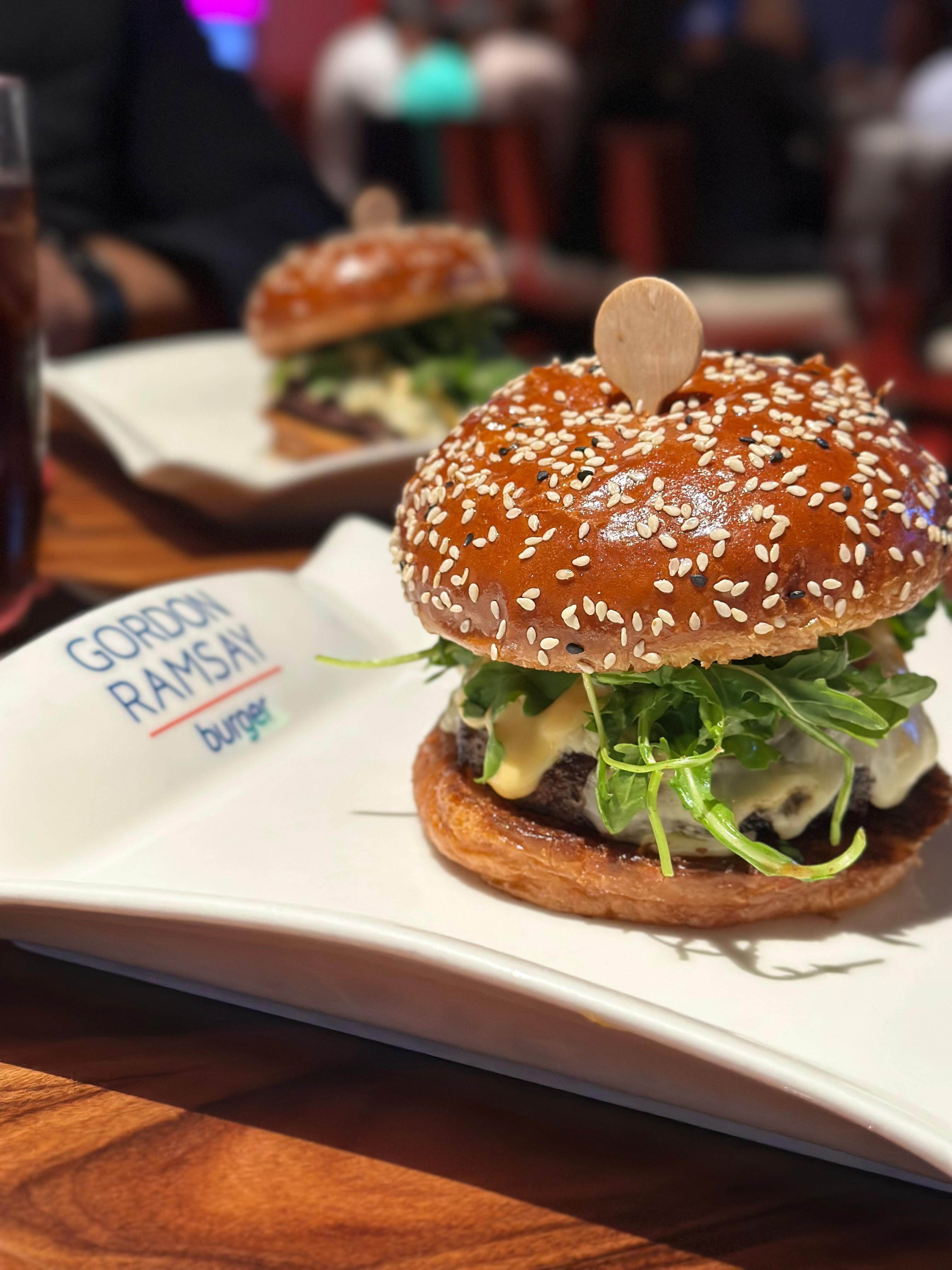 a living room with a couch a table and chairs