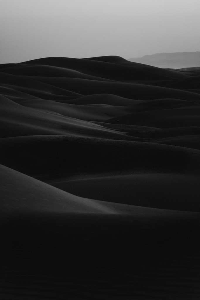 black white image of sand dunes