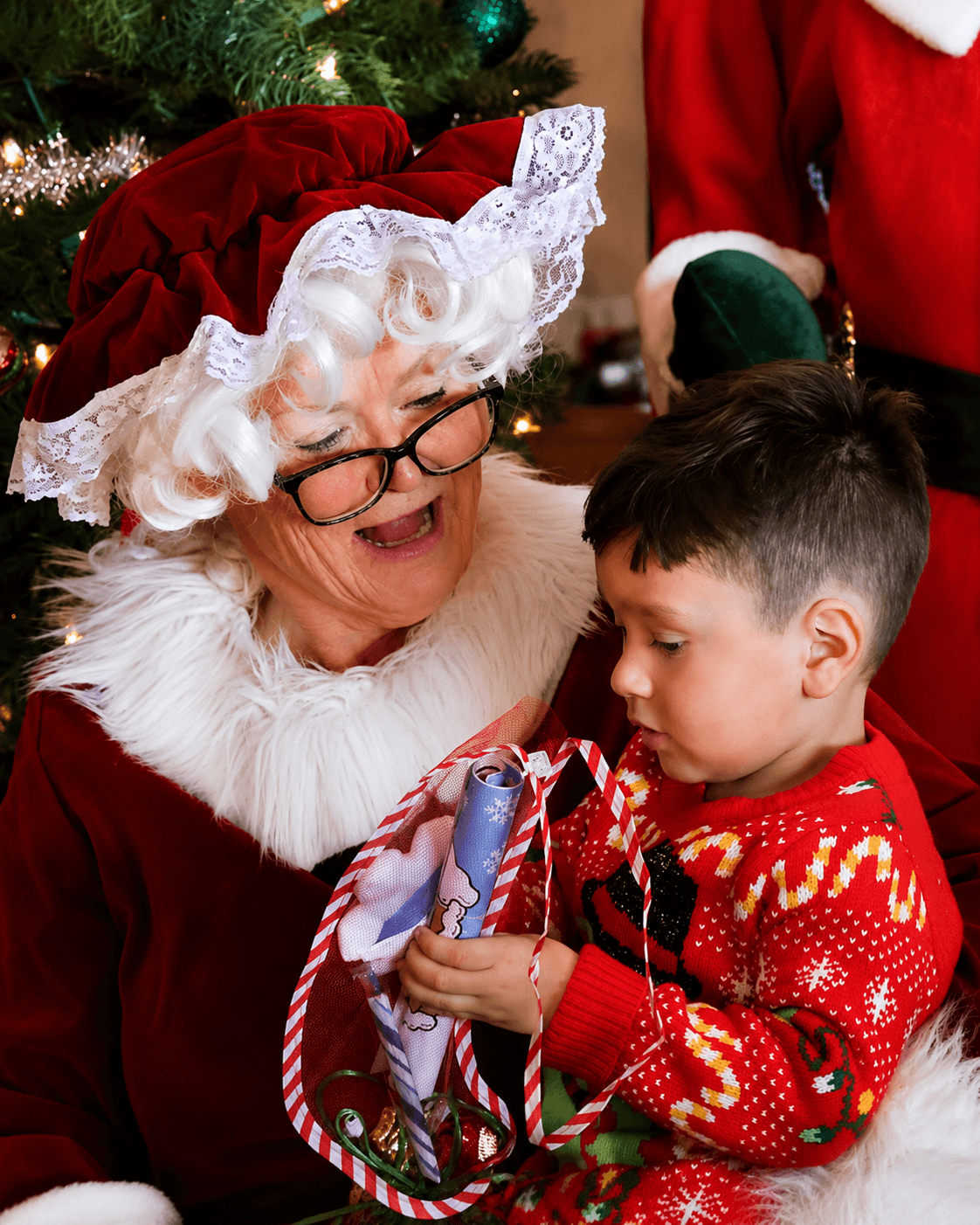 surviving child with ms clause at holiday party