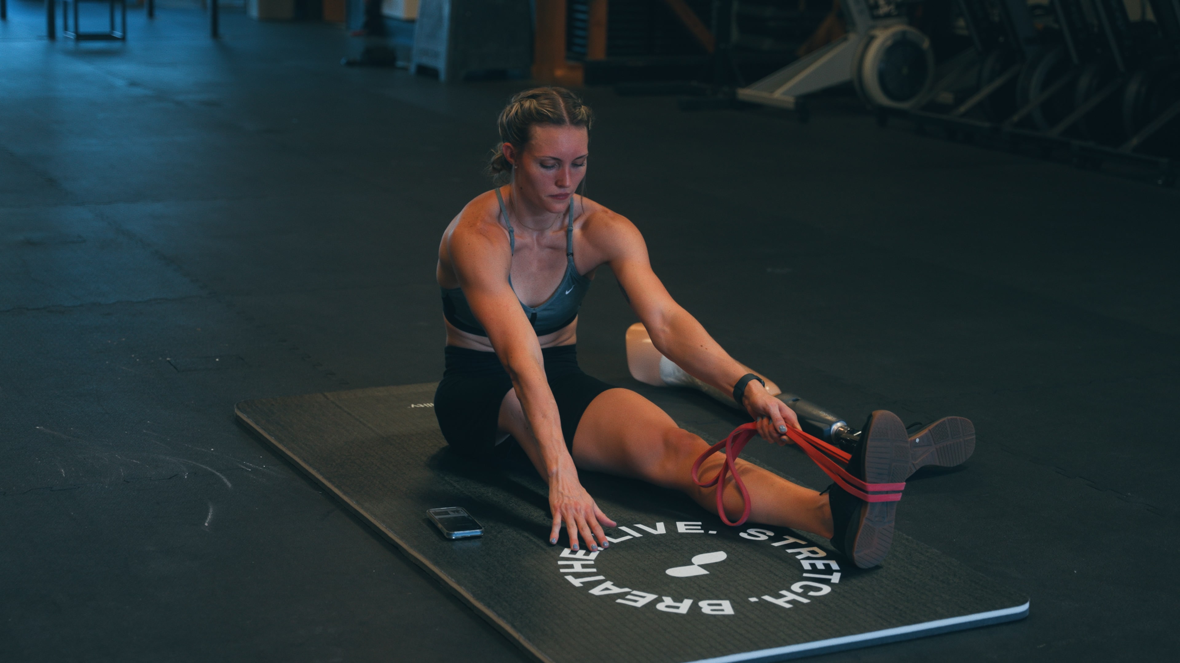 woman using adaptive bands - Resistance Band Mobility Exercises