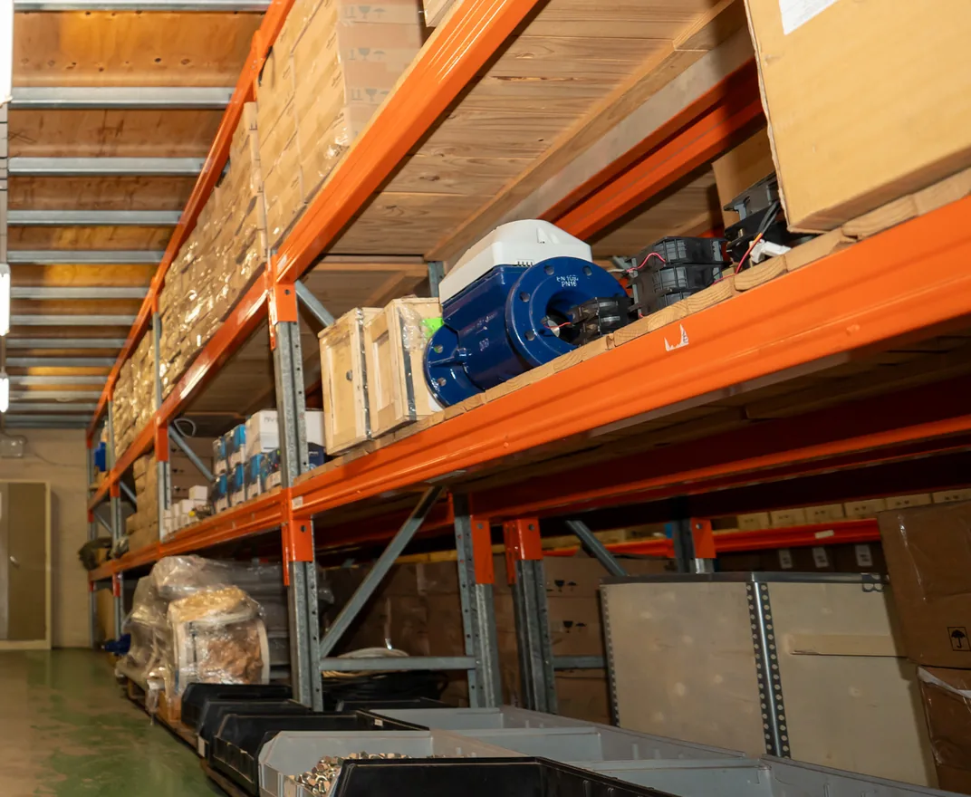 ABB motors and boxed equipment held in stock on the JOAT warehouse shelving