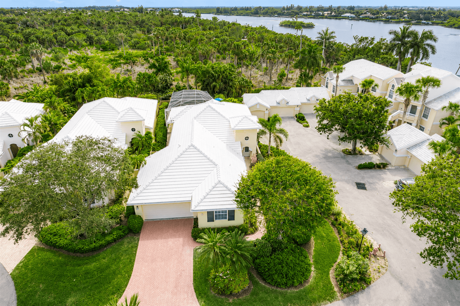 1996 New Roof Construction in Sea Oaks Lakeview Estates, Vero Beach with Entegra Flat Tile in White