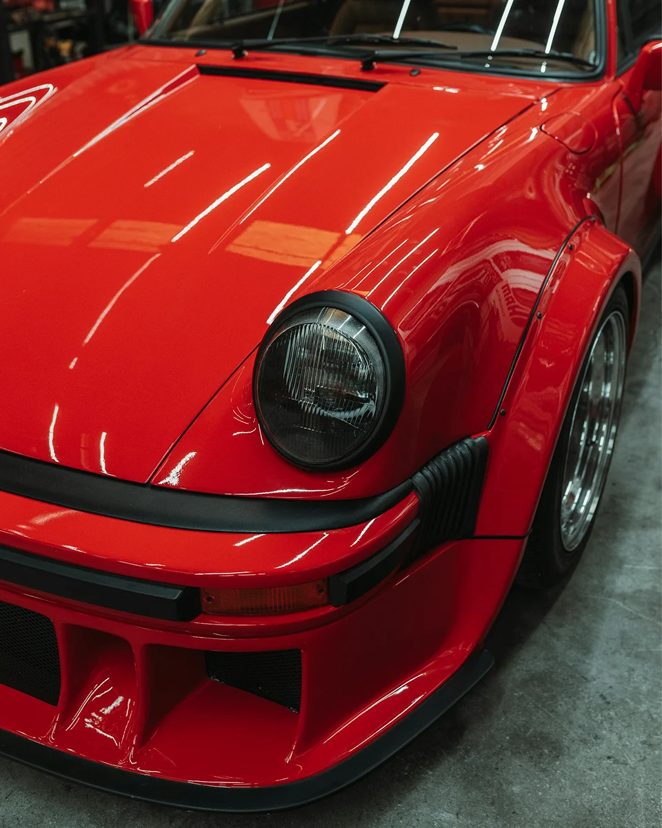 Restored vehicle headlight with improved clarity and a refreshed exterior appearance.