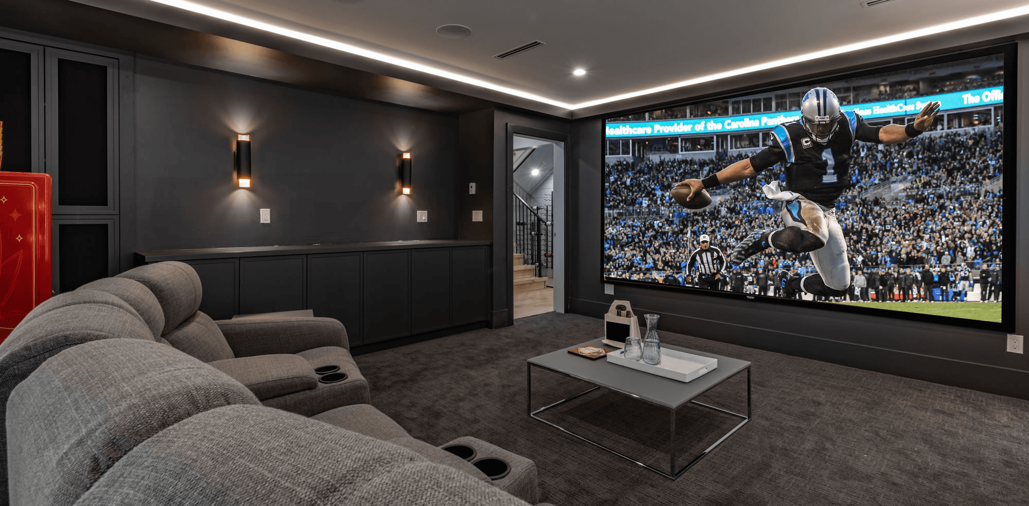 Football player on a large projection screen