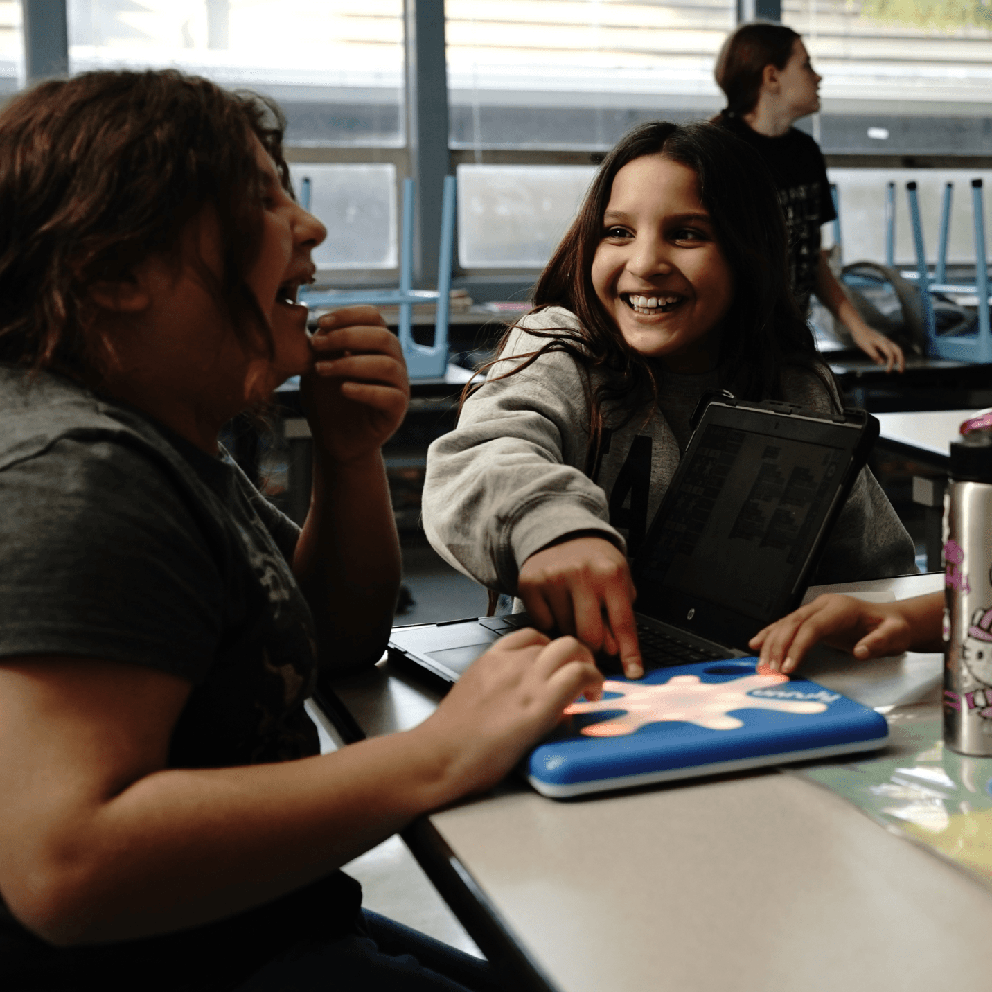 Kids building social skills and friendships at a HOKALI summer camp group activity