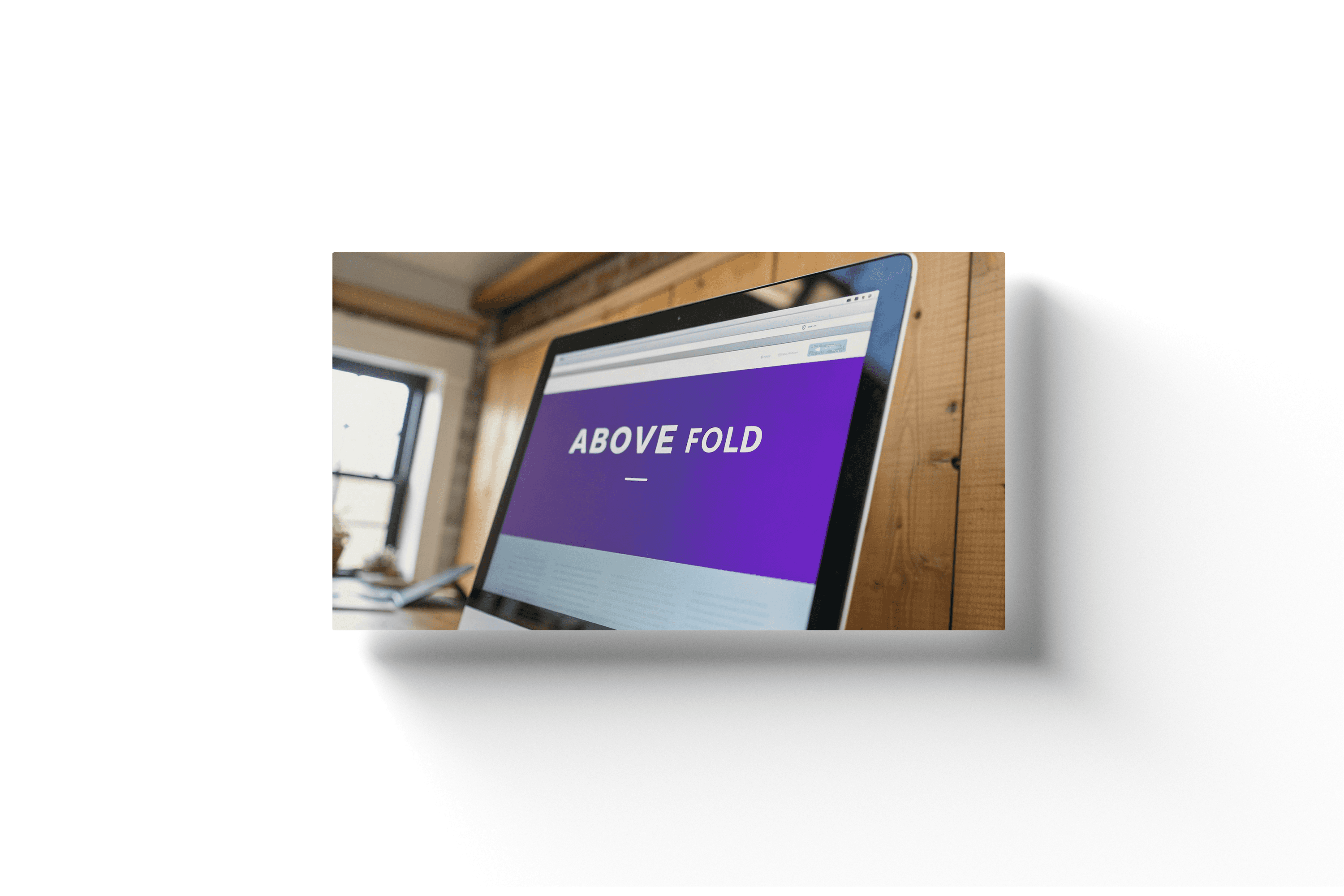a laptop screen with a purple background and the text 'above the fold'