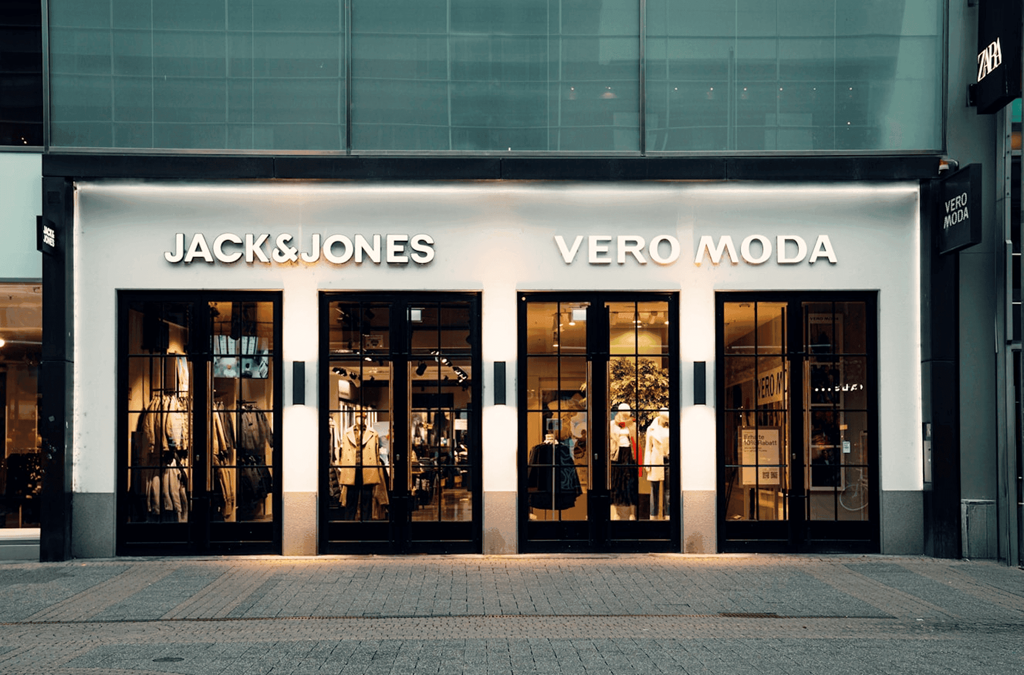 Photo of the front of a Jack & Jones and Vero Moda store side-by-side