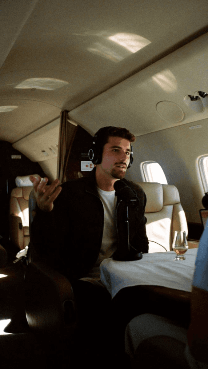 man sitting in a private jet
