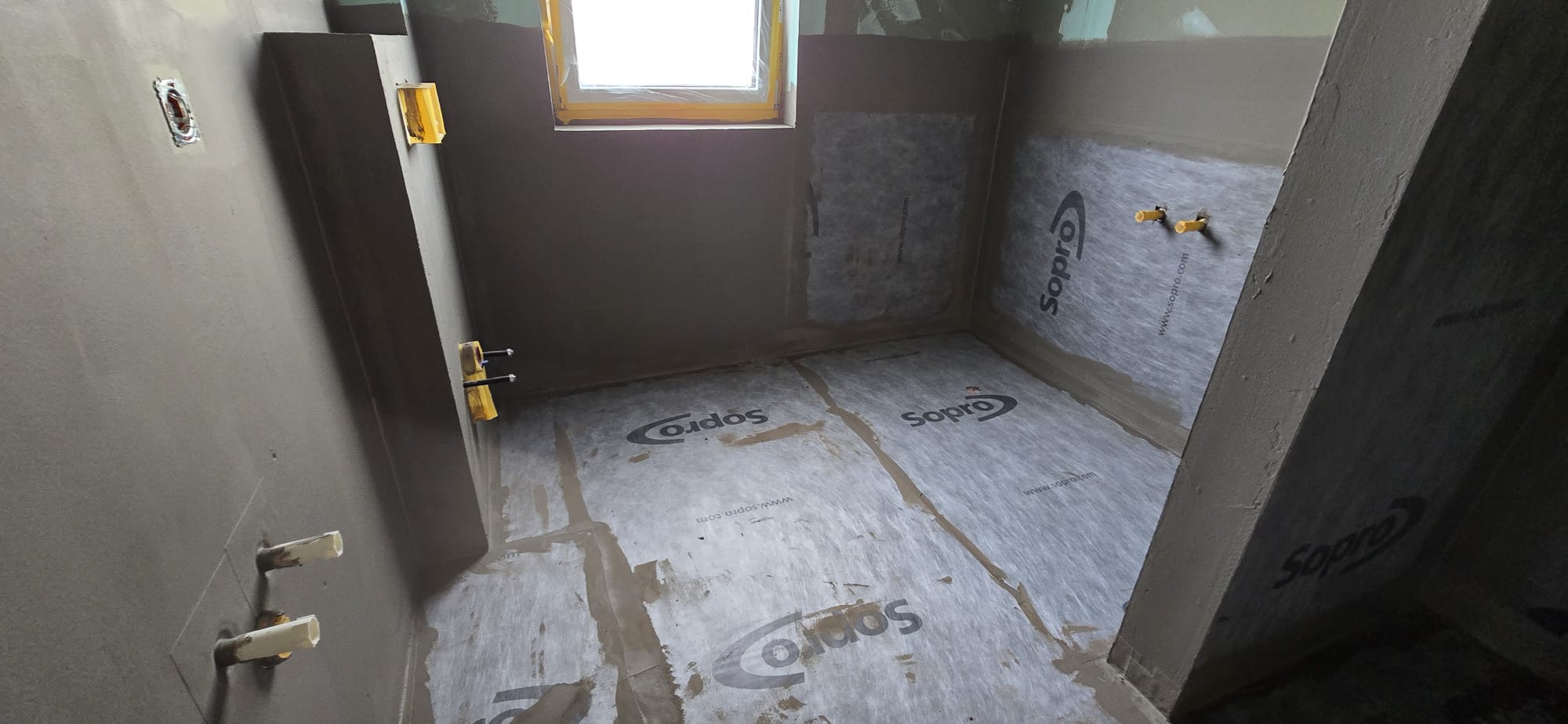 white and black house near green grass field during daytime