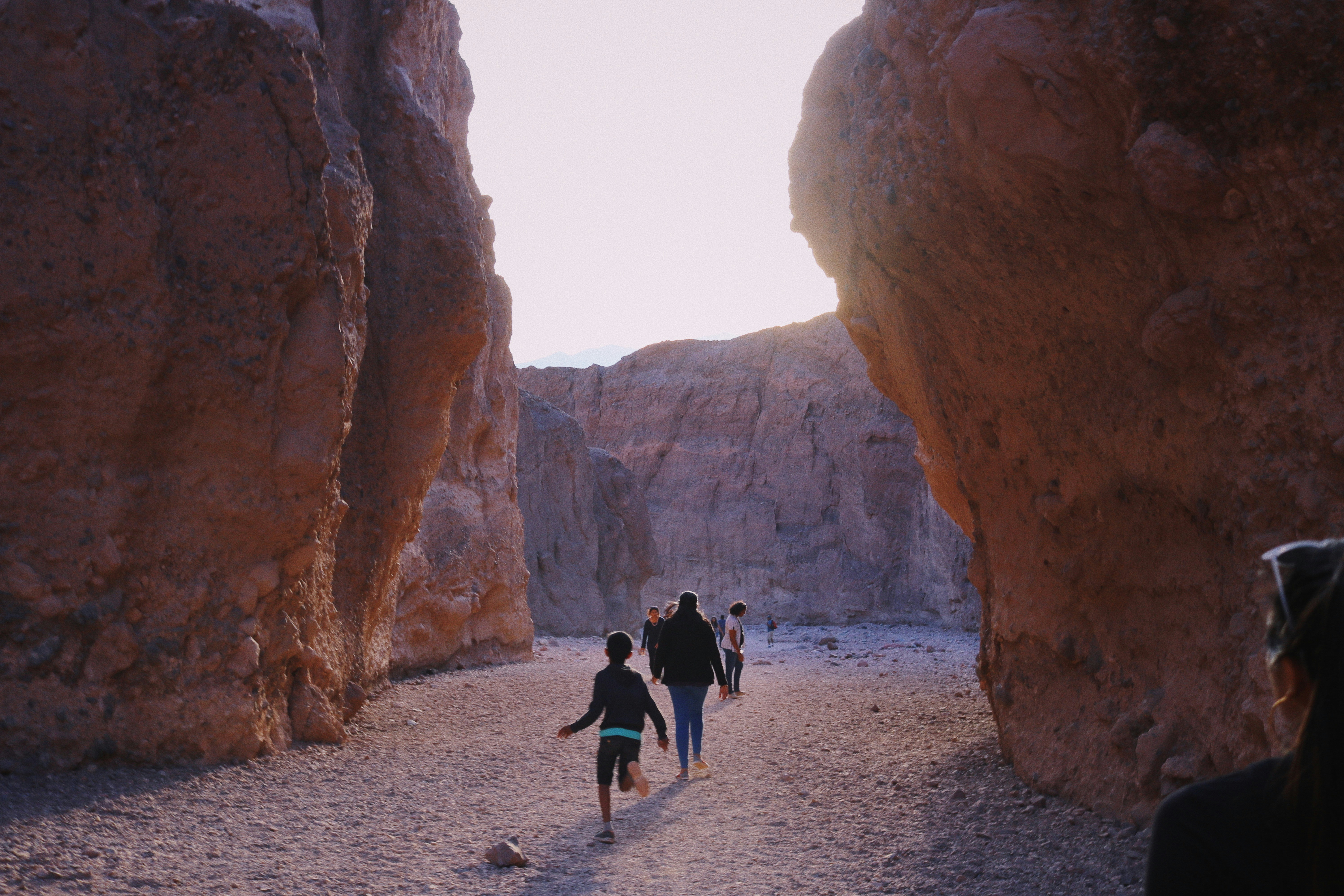 people walking in canyon