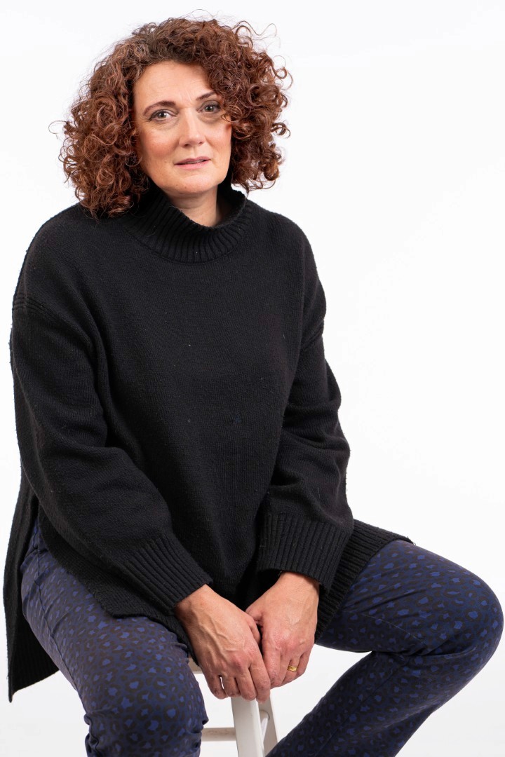 A woman having her portrait taken. 