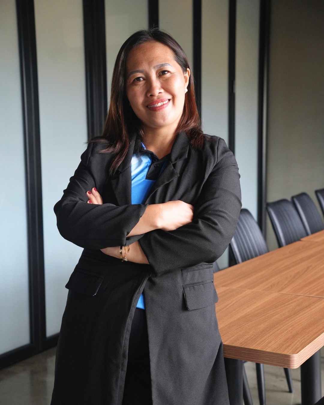 a picture of Micelle Ferraren, a real estate agent of the team