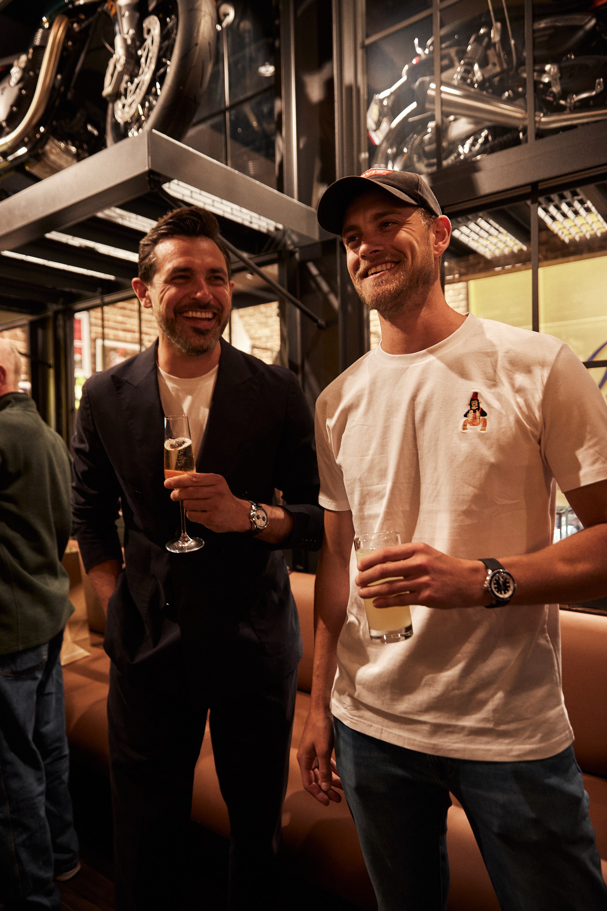 Couple embracing on street, bride's face obscured