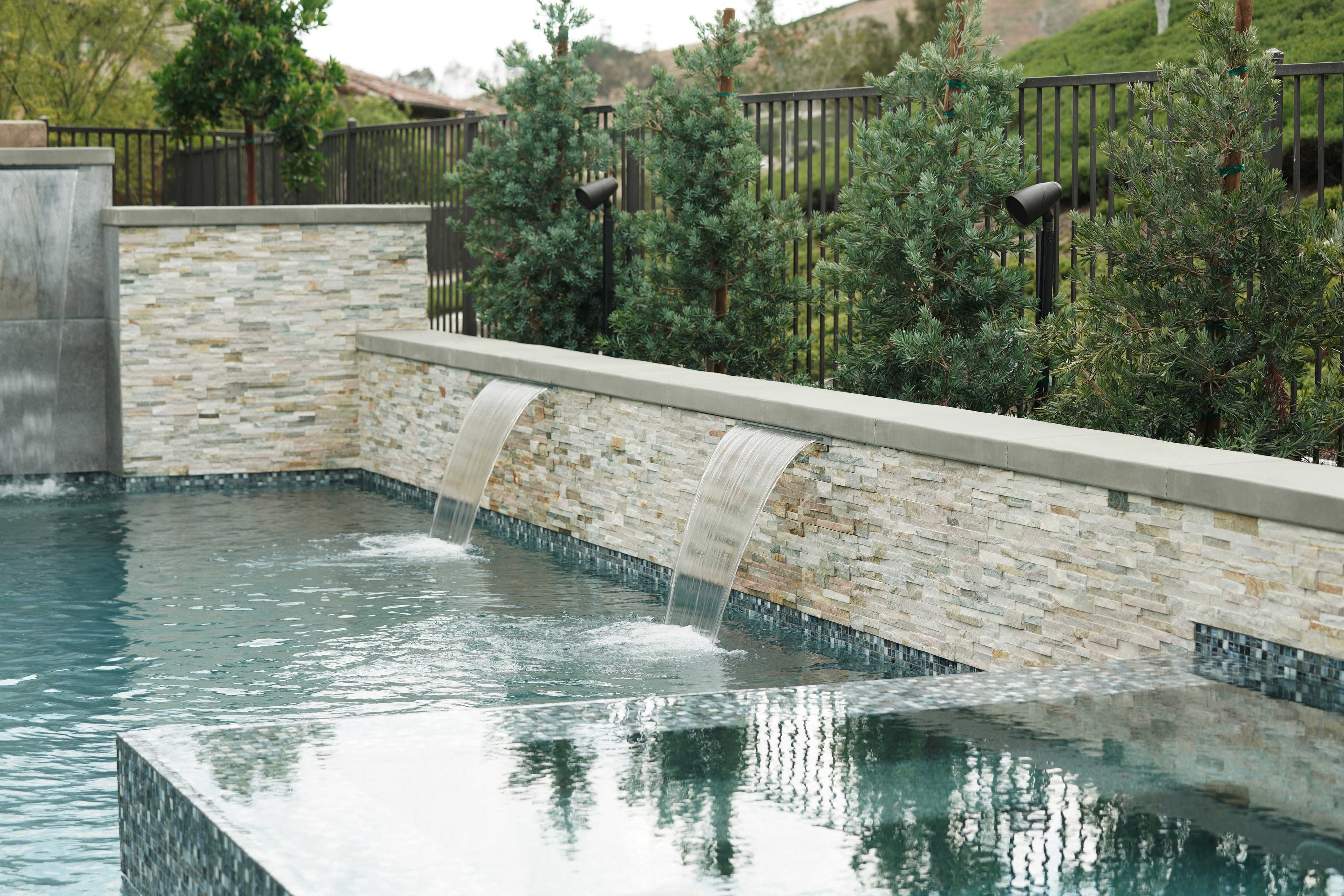 Sonance outdoor audio systems with weather-resistant landscape speakers installed in British Columbia