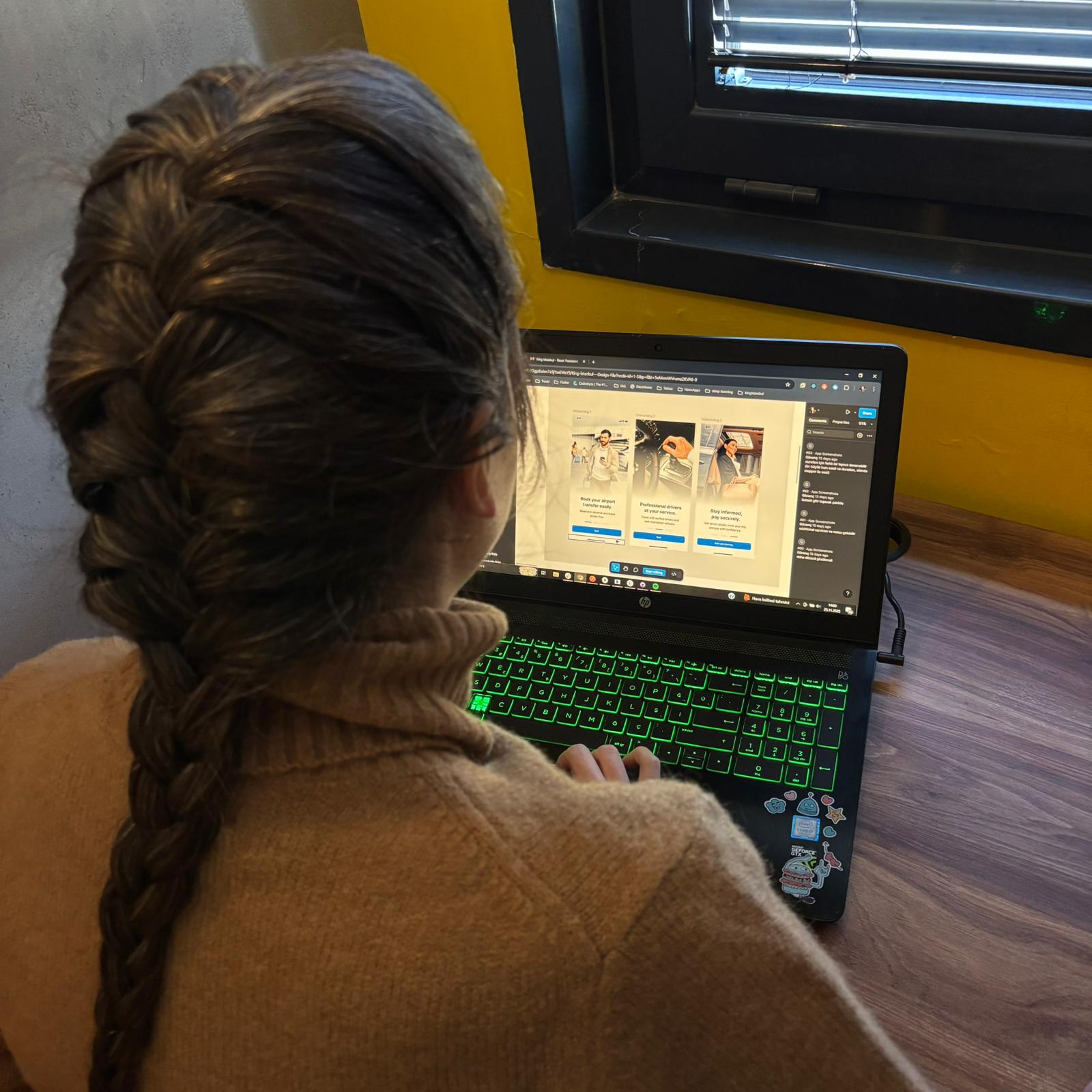 Neon Apps developer reviewing real-time transportation app UI.