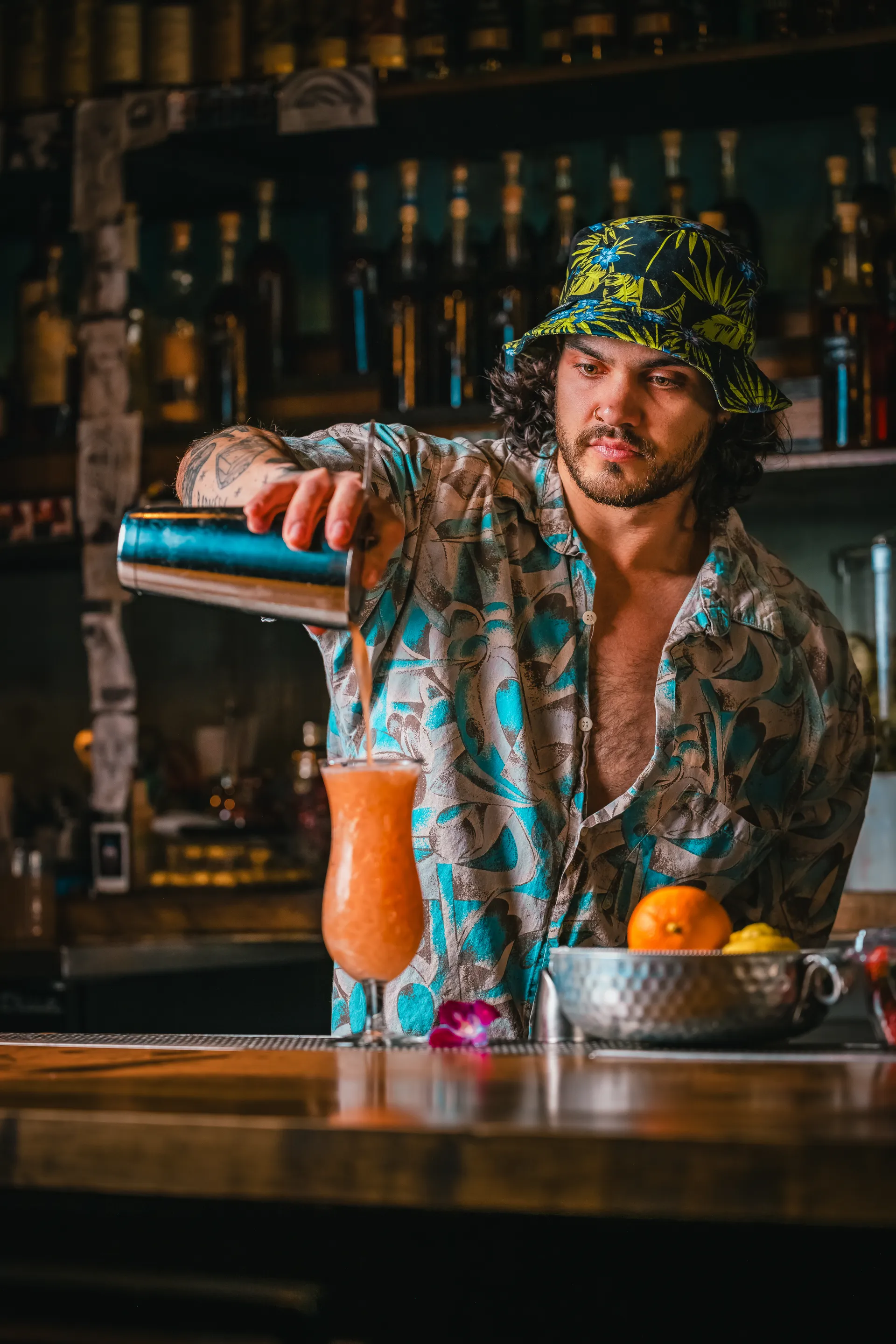 Blake pouring a hurricane