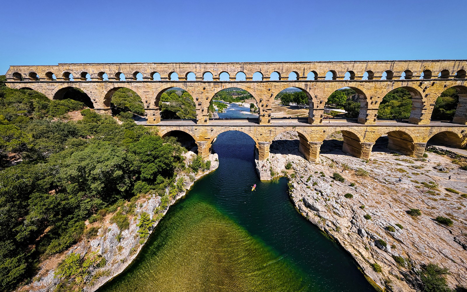 Pont du Gard aqueduct over river in Provence, France, seen on a guided tour from Avignon.
