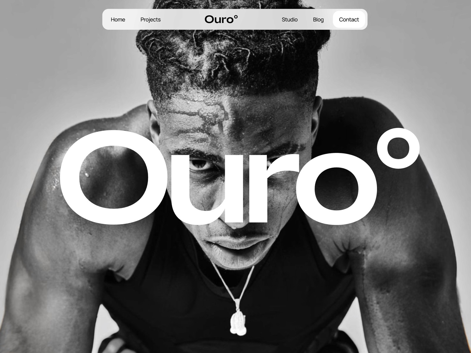Ouro — 高级暗黑极简创意机构官网设计灵感