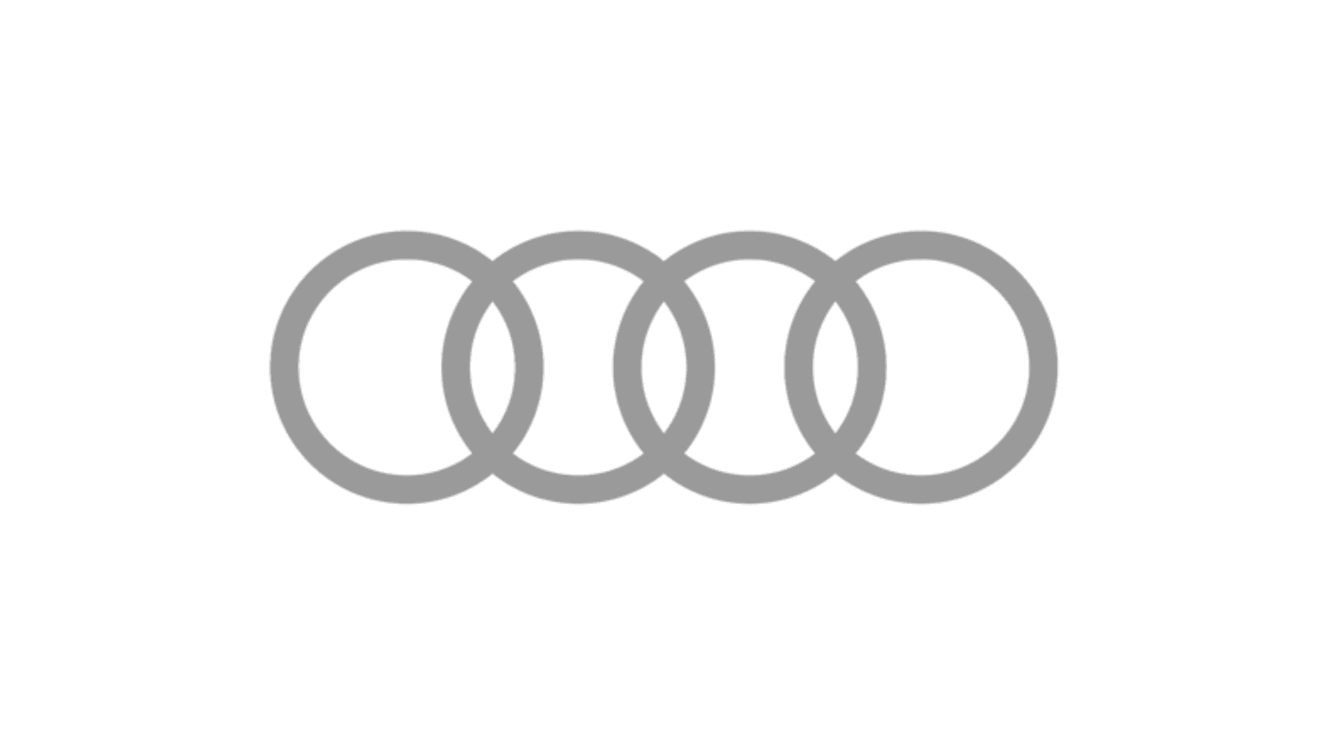 The image features a minimalist white four-ring logo on a dark blue background, emblematic of a well-known luxury automotive brand.