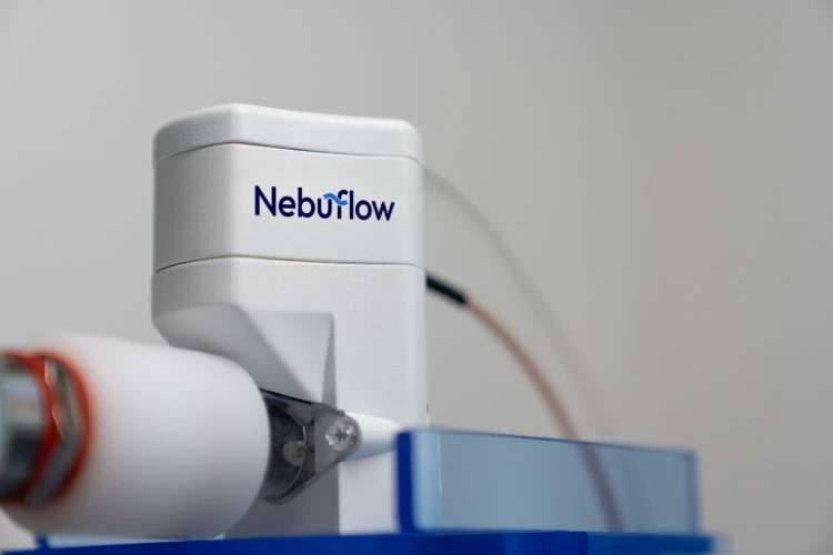 Nebu~Flow airflow device connected to tubing and system base