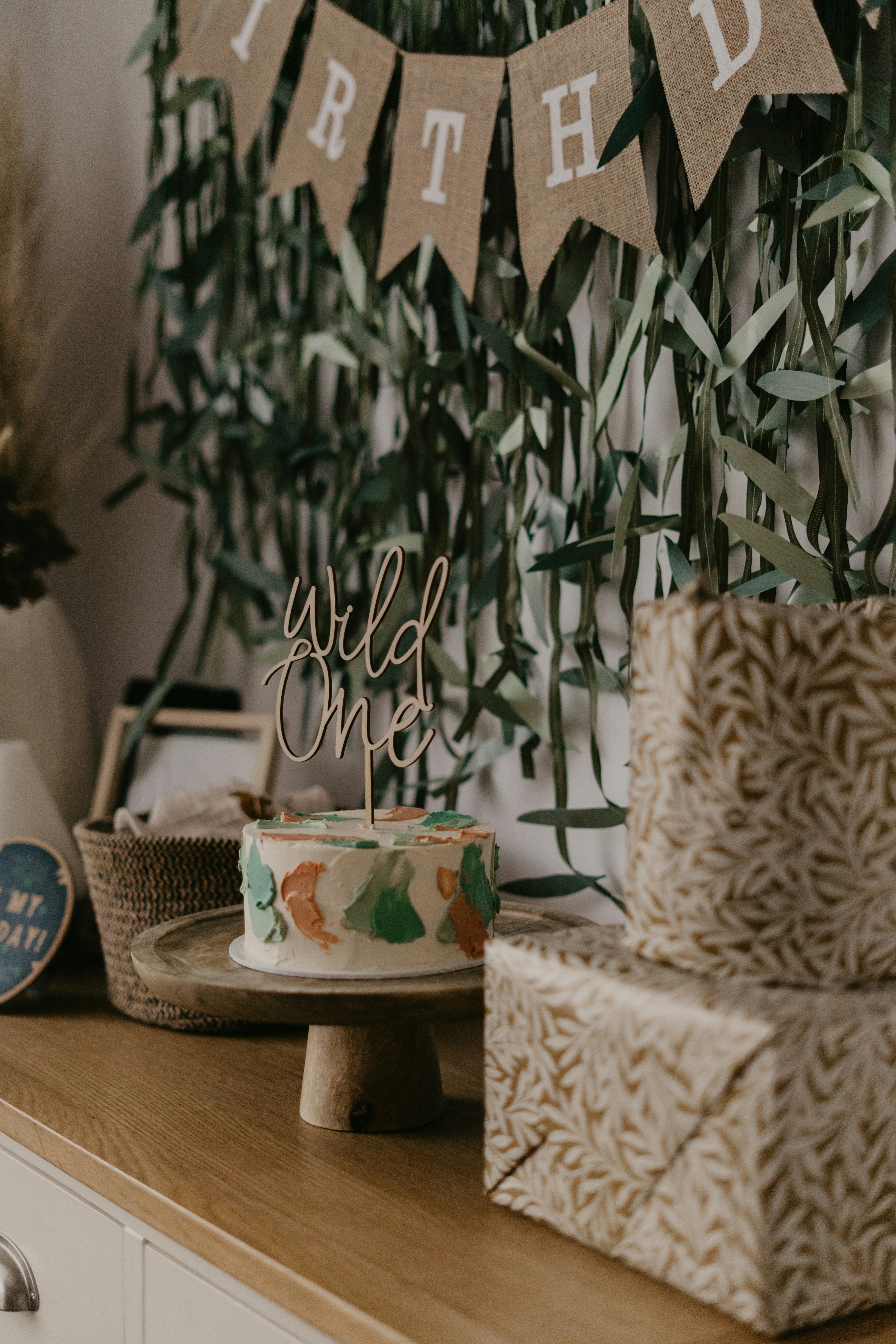 A couple embraces lovingly on a wooden dock.