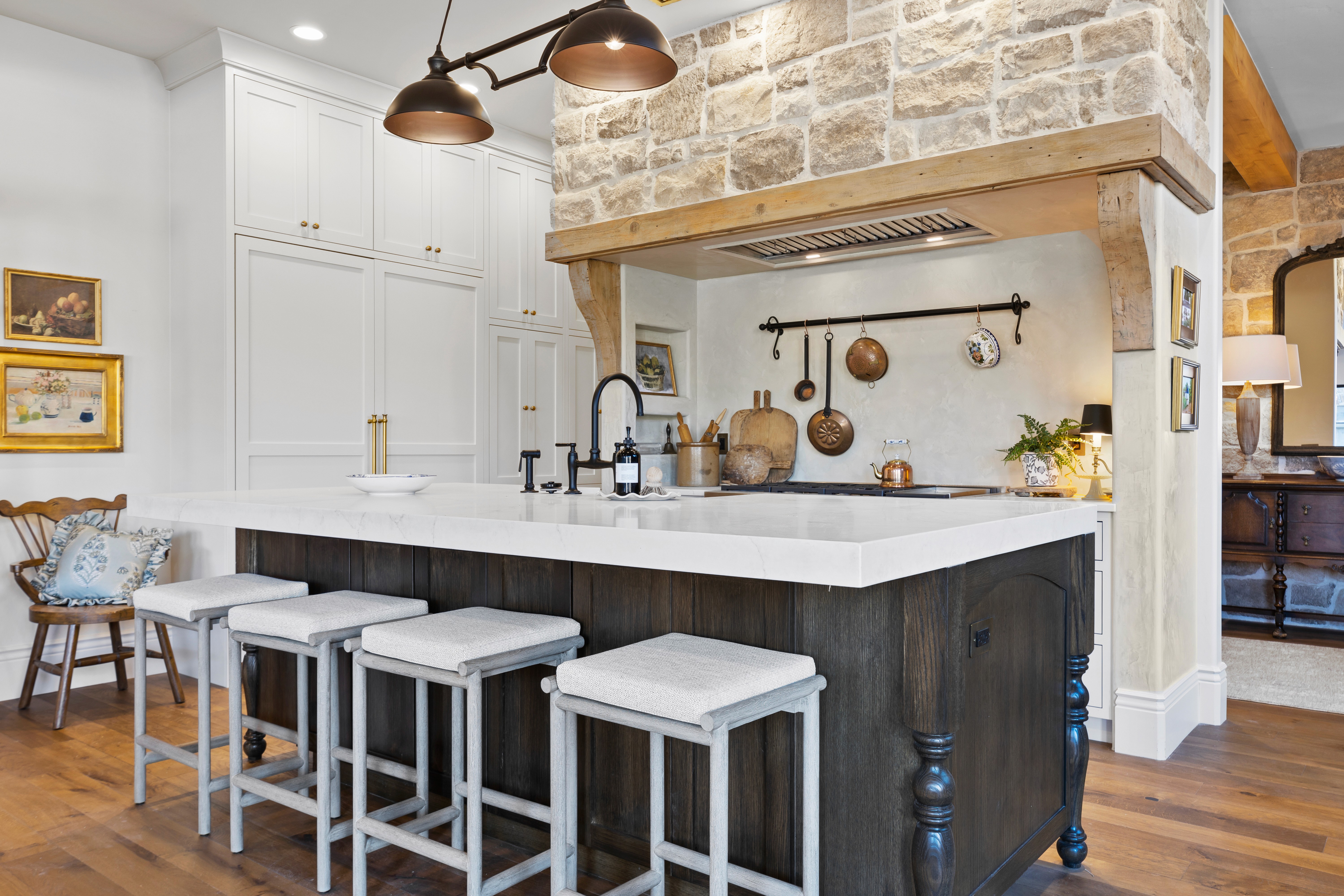 Full kitchen with stone and wood accents in a Rockville, Utah.