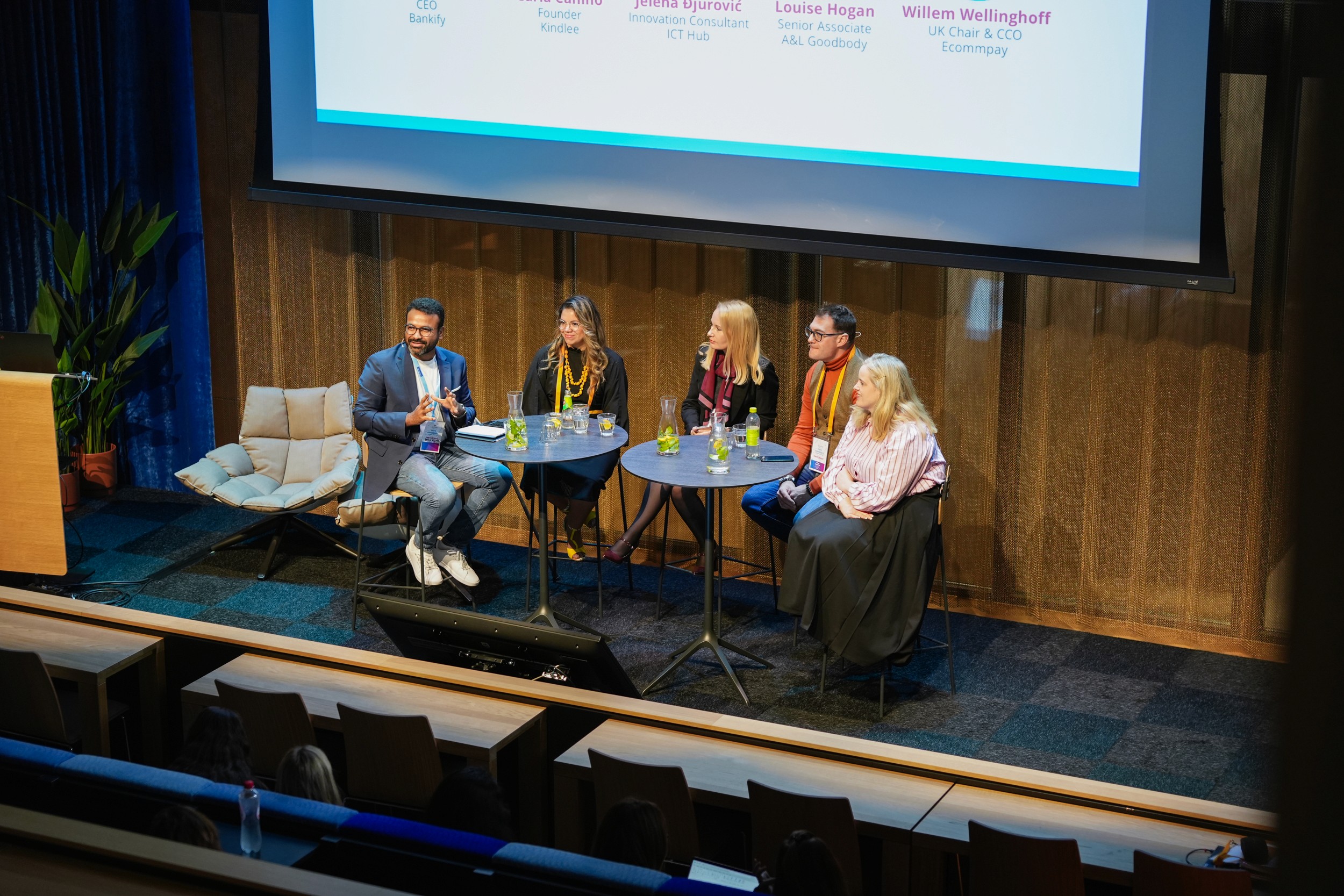 Team talking with each other at office