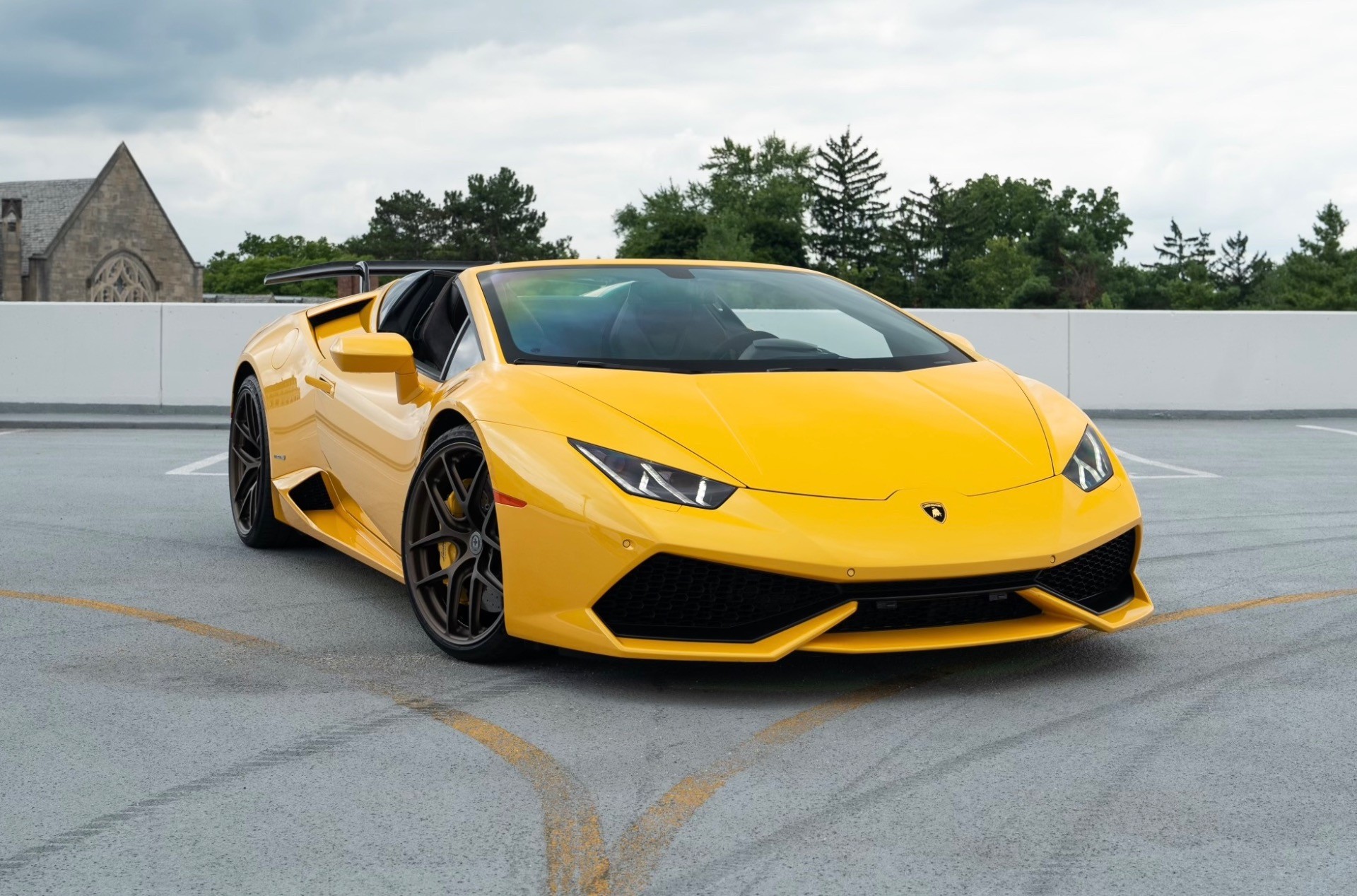 Luxury car rentals in Miami - Lamborghini Aventador on a scenic coastal drive