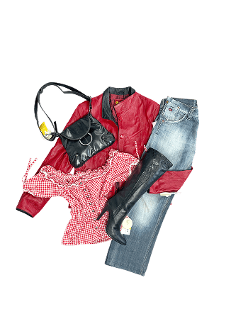 Red jacket, checkered blouse, jeans, black purse and boot on a black background.