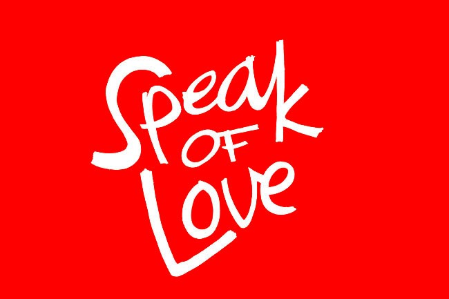 A vibrant red heart with the title "Speak of Love" written in elegant white cursive, flanked by two black-and-white microphones, symbolizing a performance piece that explores gender-swapped narratives in pop culture to highlight same-sex relationships and equality.
