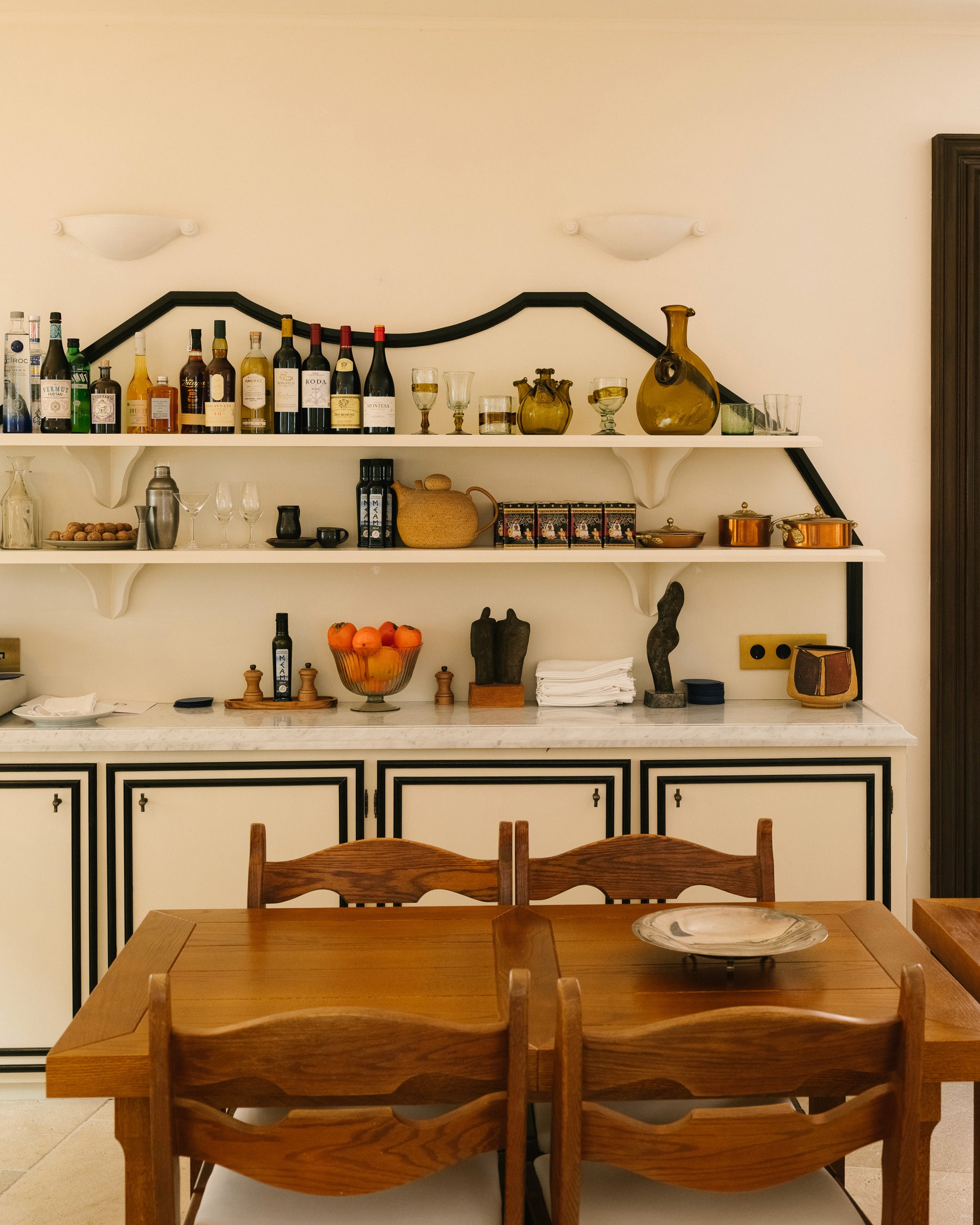 Streetside billboard with flyposters of the Batch.Works brand and illustrations