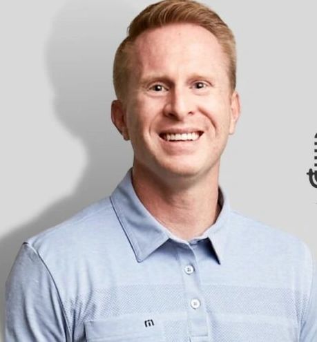 a black and white living room with a large tv