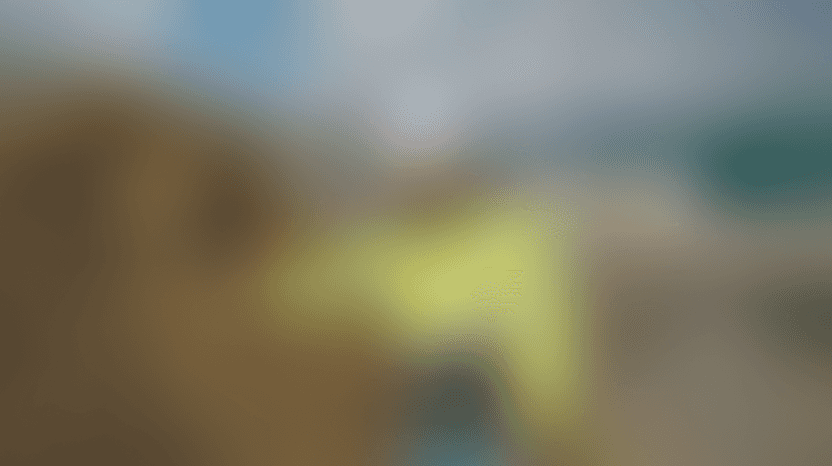 Modern spiral staircase with wooden accents and lighting