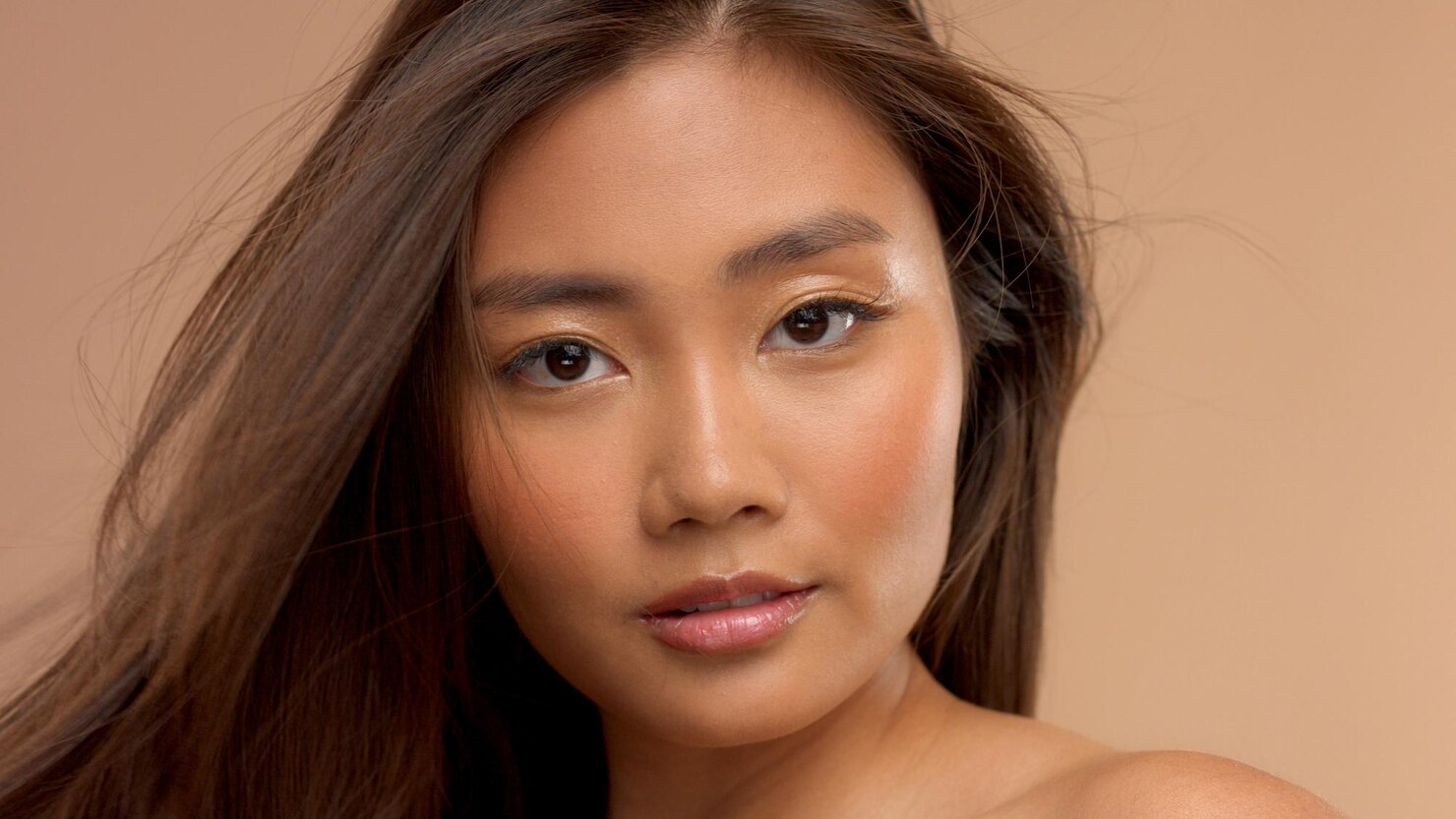 Woman posing for PICO Laser service