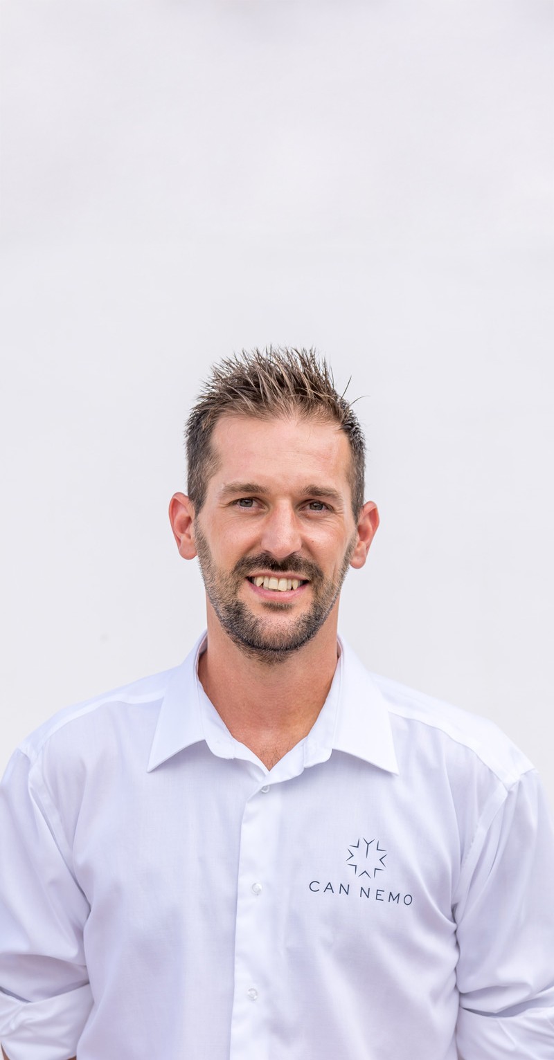 Portrait of estate caretaker responsible for property operations and technical oversight.