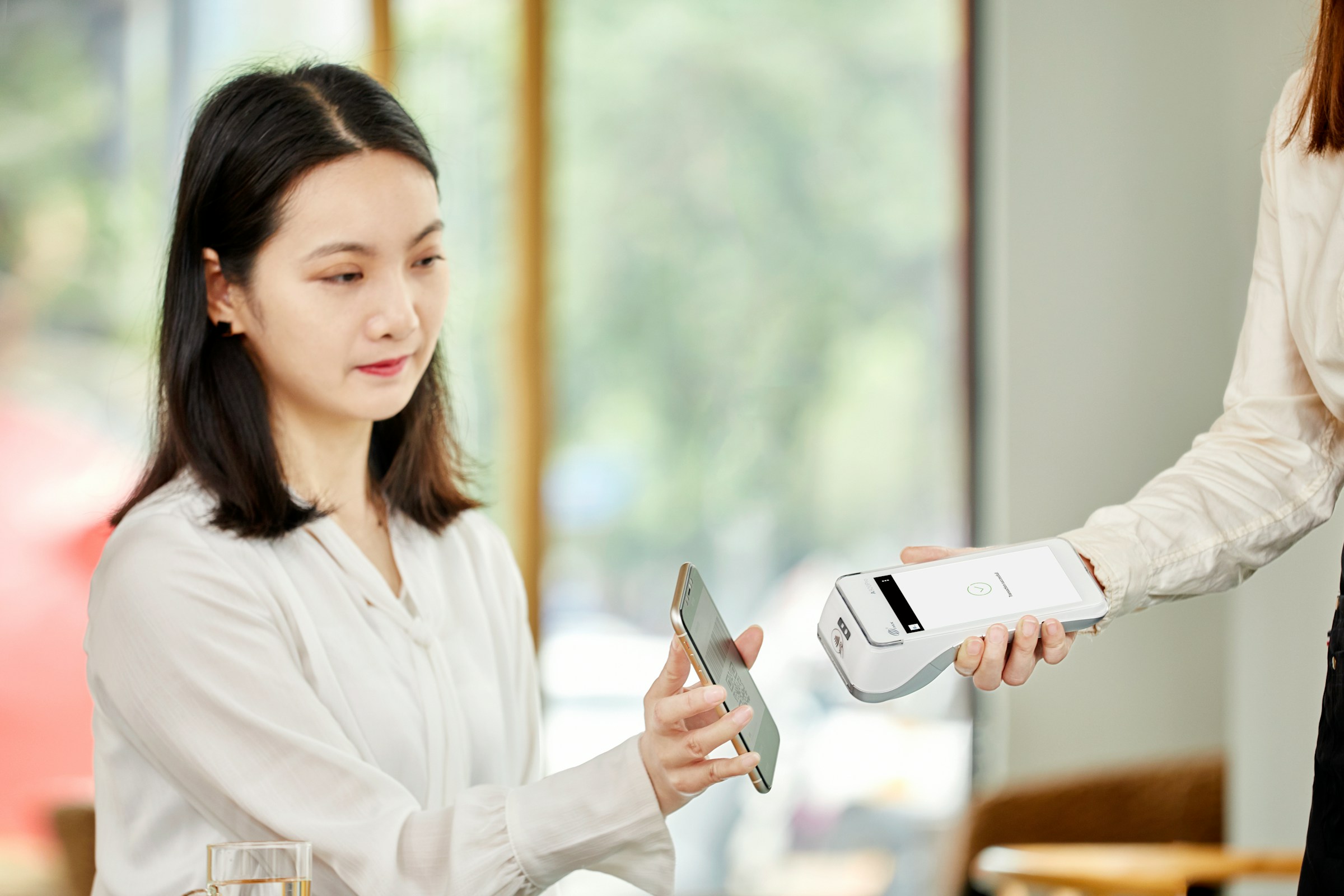 Person Helping Pay - What Is Warm Transfer