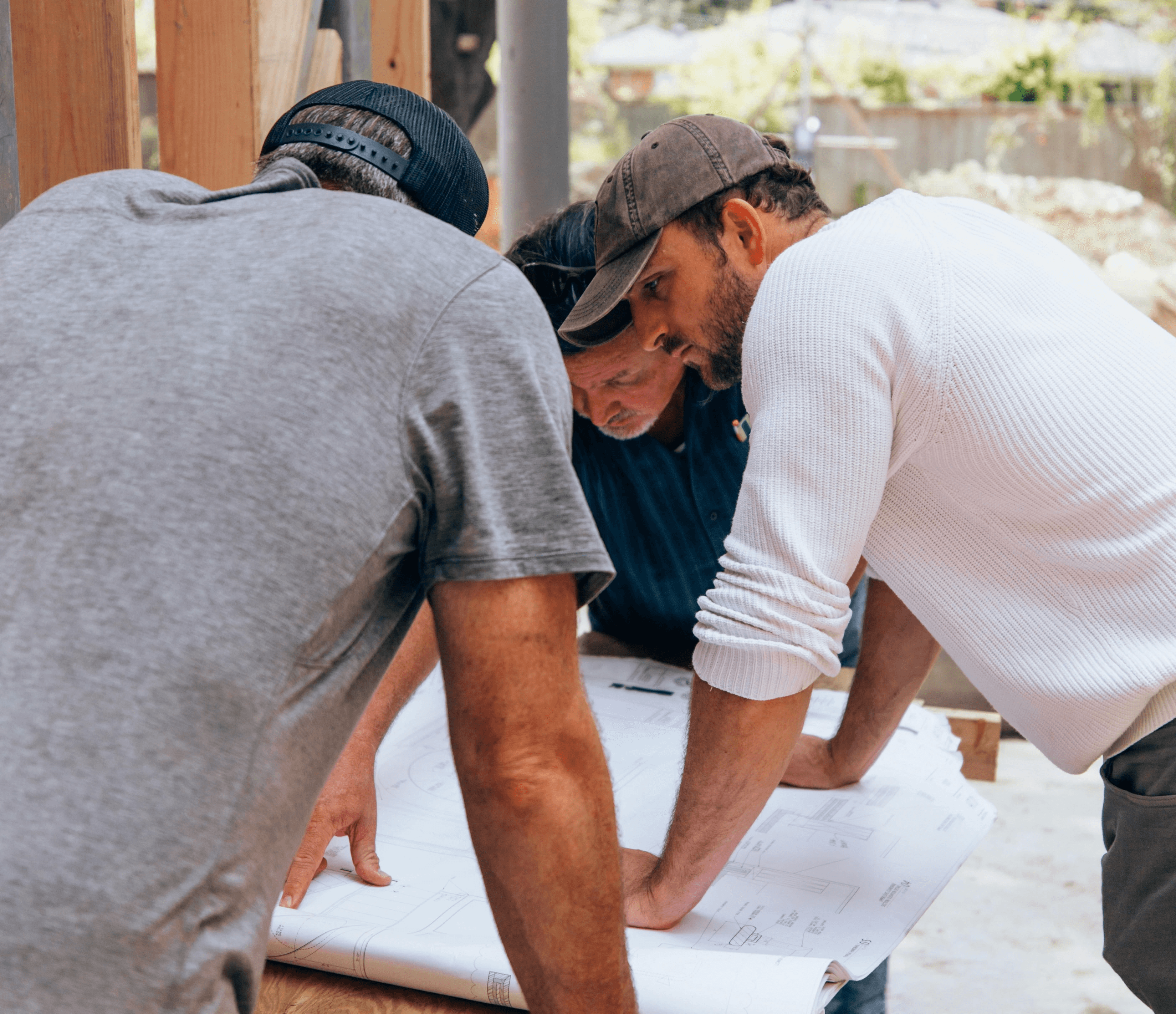 a group of men working on a project