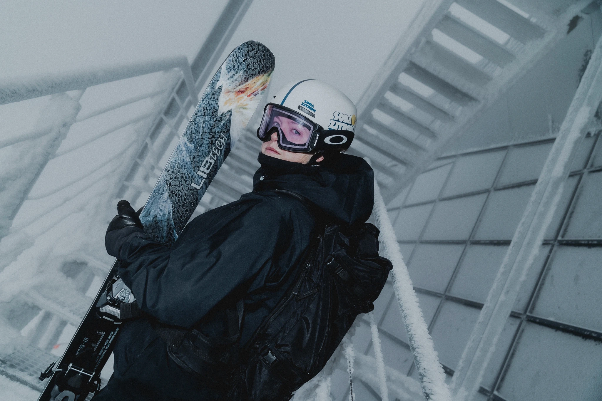 female skier looking over her shoulder.