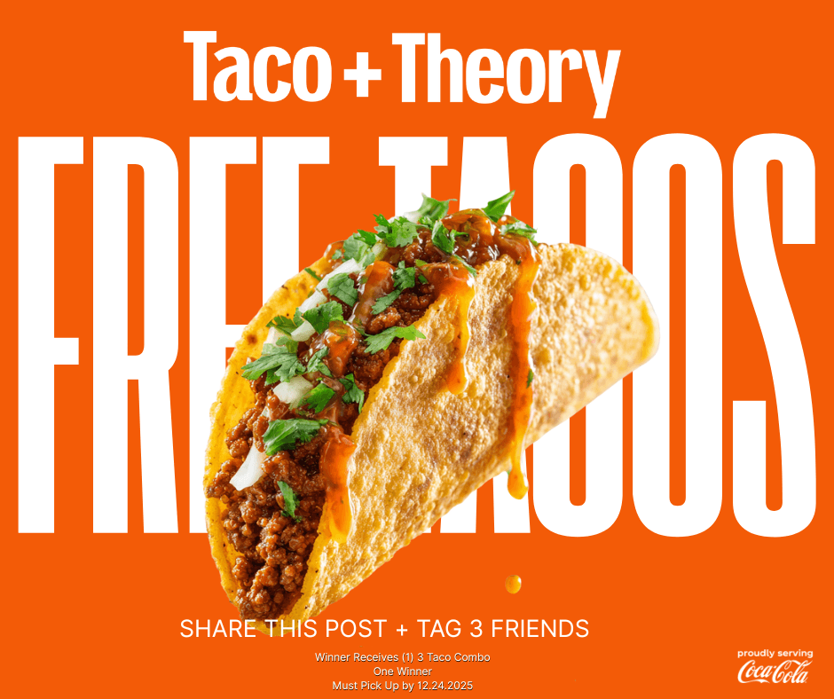 Four vibrant street-style tacos standing upright in hard shells, generously topped with shredded carrots, crispy fried protein, cilantro, and a creamy white sauce, served on a blue plate against a bright teal background.