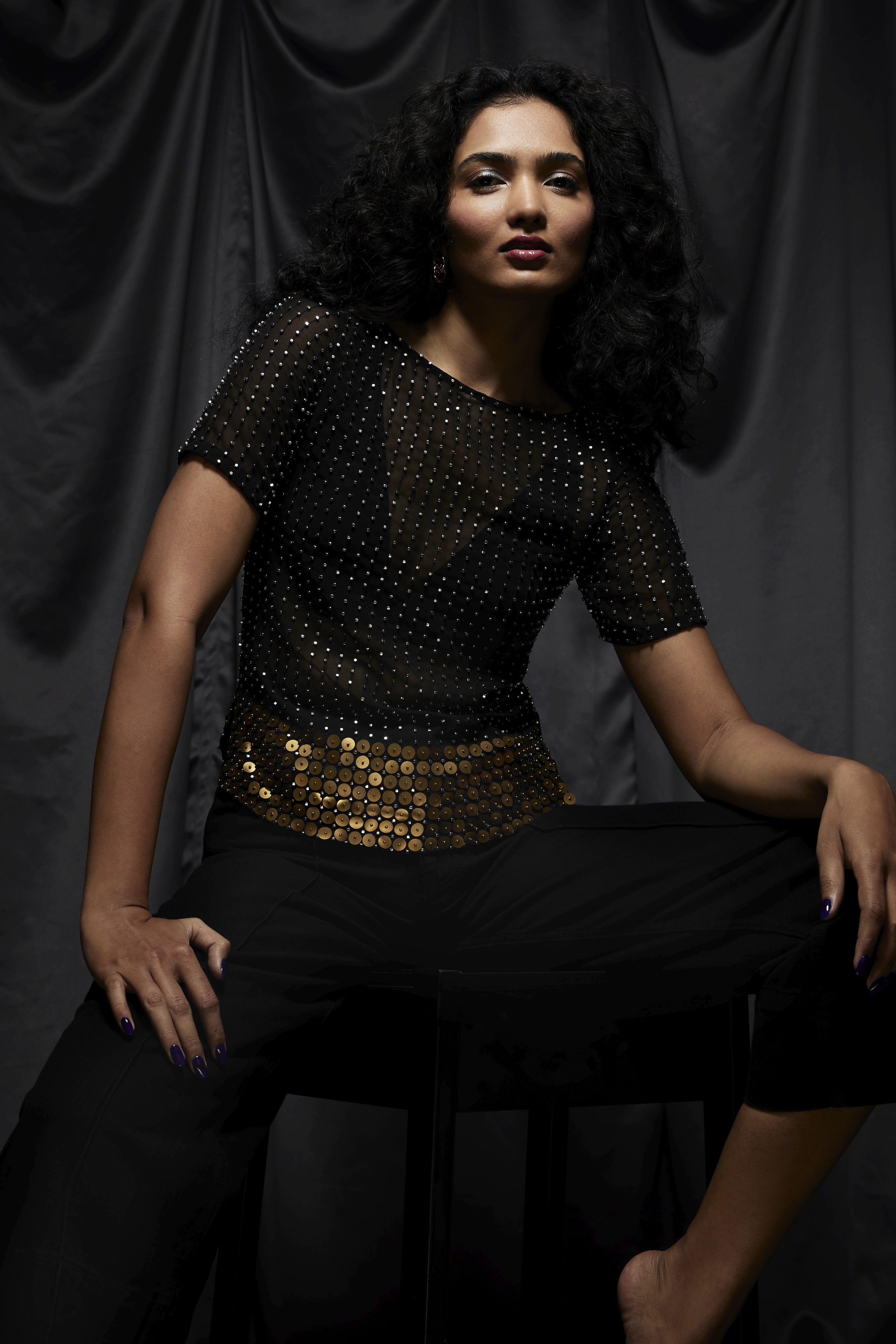 Friends laughing and posing inside a car